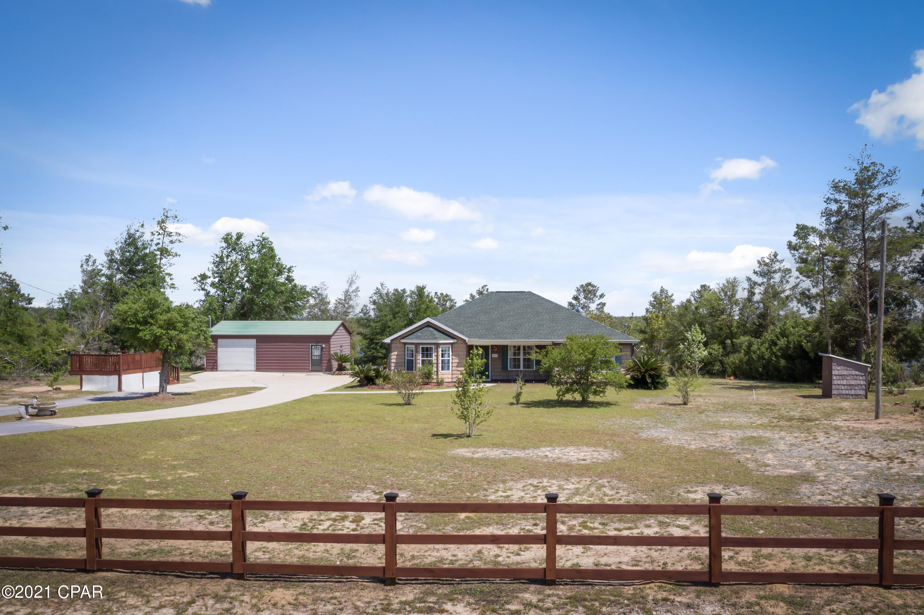 This lake front home is ready for its new owner. Located on over 5 acres on Long Lake. Home has been well maintained and move in ready. Enjoy the view of lake from your screened porch. This is country living at its best. Home has 3 bedrooms and 2 baths. The Master bedroom has a large Title shower. Kitchen has stainless Steel appliances and open to Living and Dining . Kitchen cabinets has corian countertops. New kitchen sink and for the baker a double oven. Call for appointment to see this home!!! This is a gated community and you must have a Realtor to get in.