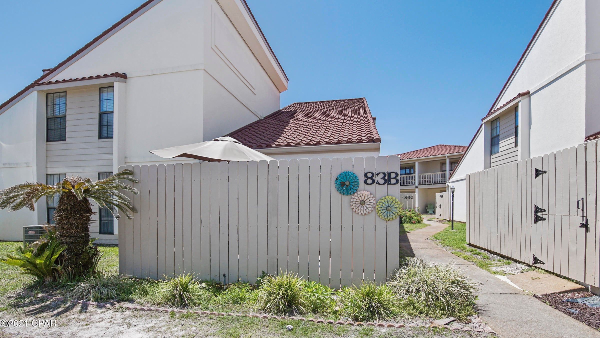 Welcome to your Beach Home! This 2 bedroom, 2 bath updated condo is located on the West end of PCB in highly sought out Horizon South. This gated community is located directly across the street from the beach, with a Private Beach Access. You will never run out of fun activities to do here. Horizon South has Multiple Pools and Hot Tubs, Tennis Courts, Pickle Ball, Shuffle Board Courts, Basketball Court, Mini Golf, Fitness Center, Horseshoe Pit and a Club House with Pool Tables. All of the chabby chic beach furniture/decor is included and is rental ready!! Sleeps 10!!
