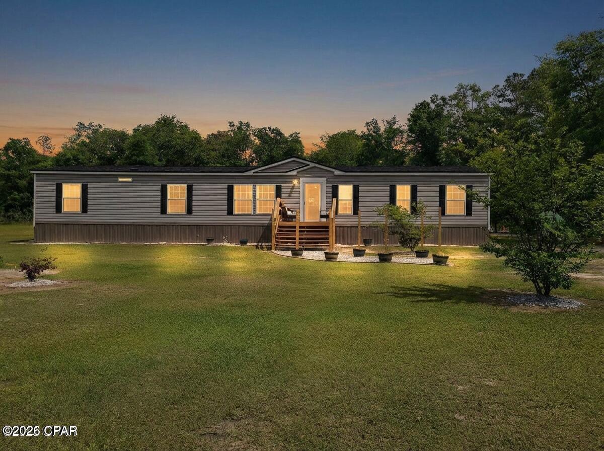 Welcome to 4296 Century Rd in the highly sought after area of Greenwood, FL! This beautiful 2,560 sq ft, 4-bedroom 2-bath home is situated on a one-acre parcel of land giving you the perfect amount of space to feel right at home. This highly coveted open floorplan boasts two spacious living areas combined with a kitchen and dining room providing you with a more comfortable lifestyle and ample space to relax and unwind. The master suite boasts an enormous 10x14 retreat and private bathroom with a separate shower and an oversized tub. The property features a well-maintained outdoor area, ideal for barbecues and family events. Upgrades include a 2022 roof and 2021 HVAC. Do not miss this opportunity to own your slice of paradise! **Seller offering up to $5,000 towards buyers closing costs or will give a buyer credit for new appliances, fencing or other improvements with an acceptable offer.**