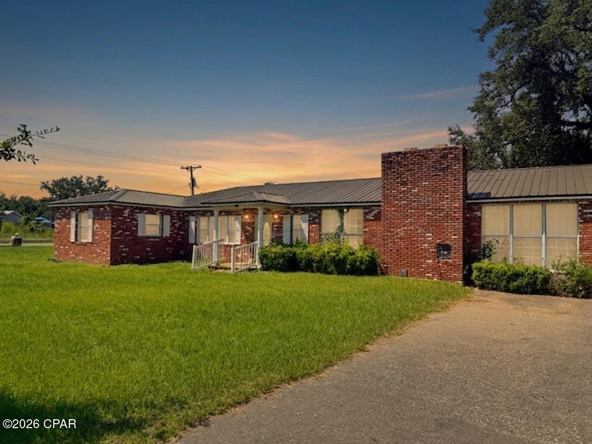 Welcome to a property filled with possibilities in the heart of Grand Ridge! Situated on a spacious corner lot directly across from Grand Ridge School, this 4-bedroom, 2-bath home offers a unique combination of space, flexibility, and investment potential. Whether you're searching for a generously sized family home, a multigenerational living arrangement, or a property with the potential to create two separate living spaces, this home provides an exciting opportunity to bring your vision to life.

Inside, you'll find a spacious living room along with a separate den featuring a fireplace, creating multiple gathering areas for everyday living and entertaining. A dedicated office filled with natural light provides an inviting place to work from home, while an additional flex space adds even more versatility. This smaller bonus area could serve as a hobby or craft room, reading nook, playroom, study area, home gym, additional office, or convenient storage space.

One of the property's most distinctive features is its two kitchens and separate entrances, opening the door to a variety of possibilities. The home could be enjoyed as one large residence or configured to provide more independent living areas for extended family or multigenerational households. For an investor, the layout may also offer excellent potential for conversion into two rental units, subject to applicable zoning, permitting, and local requirements. Each side has kitchen facilities, a separate entrance, and space that could accommodate its own laundry area--providing a strong foundation for an investor with the right vision.

The outdoor space offers just as much potential. The expansive corner lot features a convenient horseshoe driveway, carport, two large storage sheds, and a firepit area in the side yard. There's plenty of room for outdoor gatherings, recreation, gardening, or simply enjoying the relaxed pace of small-town living. A newer metal roof adds another valuable improvement to the property. Located directly across from Grand Ridge School and within a charming community, this property stands out for its versatility. 
If you've been searching for a property where location, space, and opportunity come together, this one deserves a closer look. Bring your ideas and discover just how much potential this Grand Ridge property has to offer.
Schedule your private tour today!
*Virtual styling has been used in select photos to illustrate potential furniture placement and decor options.