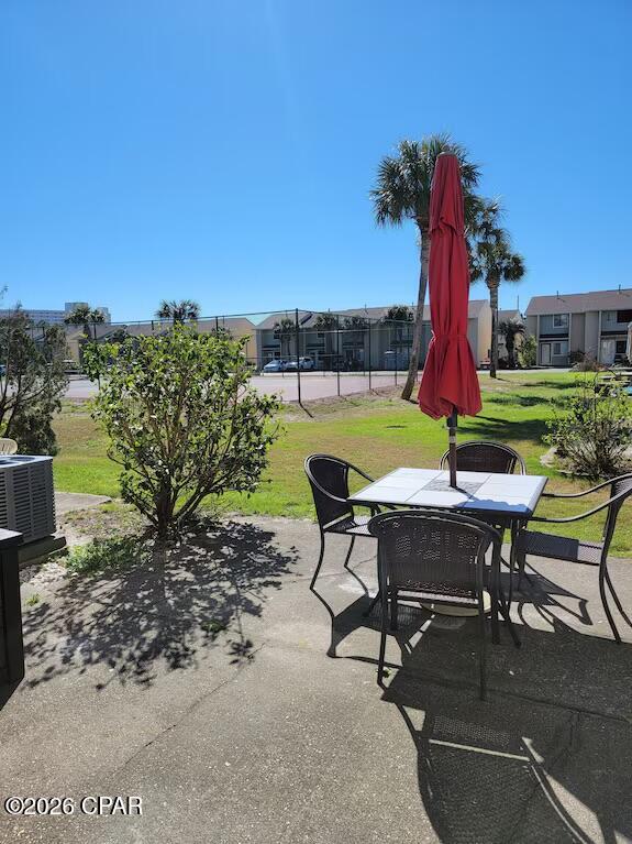 Tour this unit, fall in love, and Make an Offer on this 2 Bedroom, 1.5 bath Townhome that backs up to the tennis courts, pool, and shuffleboard courts... a renter's dream location. This unit comes fully furnished and turn-key ready to rent and would make an excellent 1st or 2nd home and a great Investment Property.   Upgrades include NEW ROOF installed 2-5-2026, Rinnai Tankless Water Heater is less than a year old, HVAC replaced almost 6 years ago, Newer Flooring and Cabinets.  Gulf Highlands Beach Resort is a golf cart and pet friendly community. It has 11 Pools (one of the 11 pools is located on the Gulf side in the Private Beach House with a great Cafe/Bar), Tennis and Pickleball courts, 18-hole Mini Golf Course, play areas, Work out room, Community Room. This resort is in walking range to restaurants, shopping, Post office, Groceries, ER Department, storage units, banks, and much more. If Age, SF, and dimensions are approximate. More pictures coming!