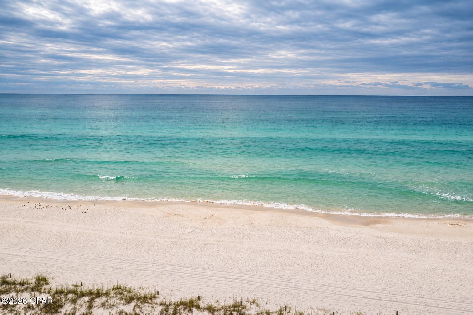 Beyond the dunes and just a short walk/bike/golf cart ride from the Gulf, 331 Palm Drive offers the freedom to create your own coastal retreat. Located in desirable Laguna Beach near the public beach access, this vacant homesite has no HOA and is ideal for a private residence, vacation home, or investment. Enjoy the quieter west end of Panama City Beach, minutes from shops, restaurants and 30A.