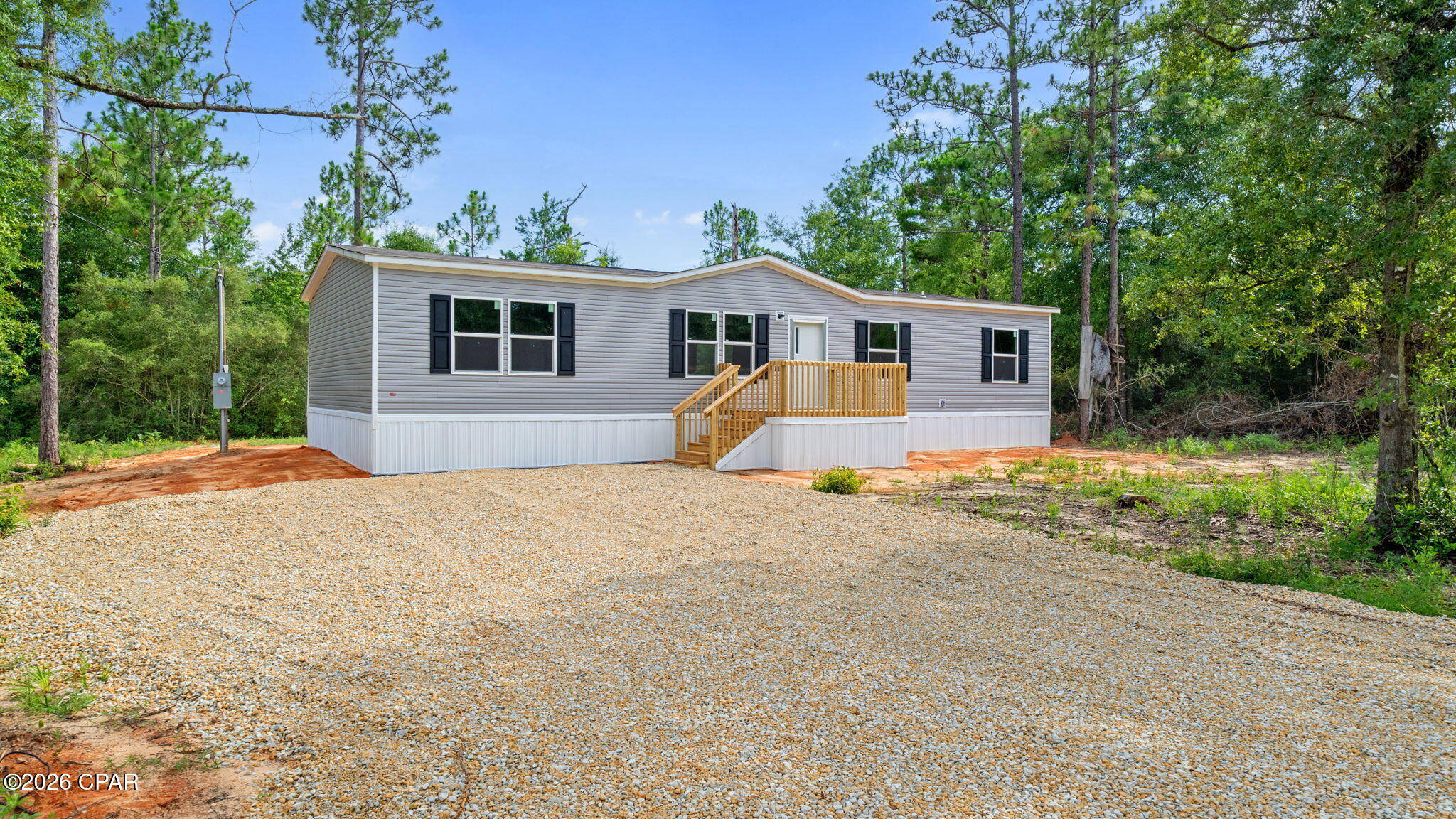 Brand-new manufactured home on a spacious homesite in Fountain, Florida! This move-in-ready property offers comfortable country living with plenty of room for a pole barn, workshop, detached garage, RV/boat parking, or additional storage.

Enjoy fresh air, privacy, and open space while remaining approximately 45 minutes from Panama City, Panama City Beach, Northwest Florida Beaches International Airport, shopping, grocery stores, restaurants, and medical facilities. Bay County has also begun paving roads within the neighborhood, adding accessibility and continued improvement to the area.

Whether you are purchasing your first home, downsizing, or looking for an affordable property with room to grow, this home offers a great combination of space, convenience, and peaceful rural living. Schedule your private showing today! ****All measurements and information is deemed reliable, and should be verified by buyer or buyer's agent if important.**