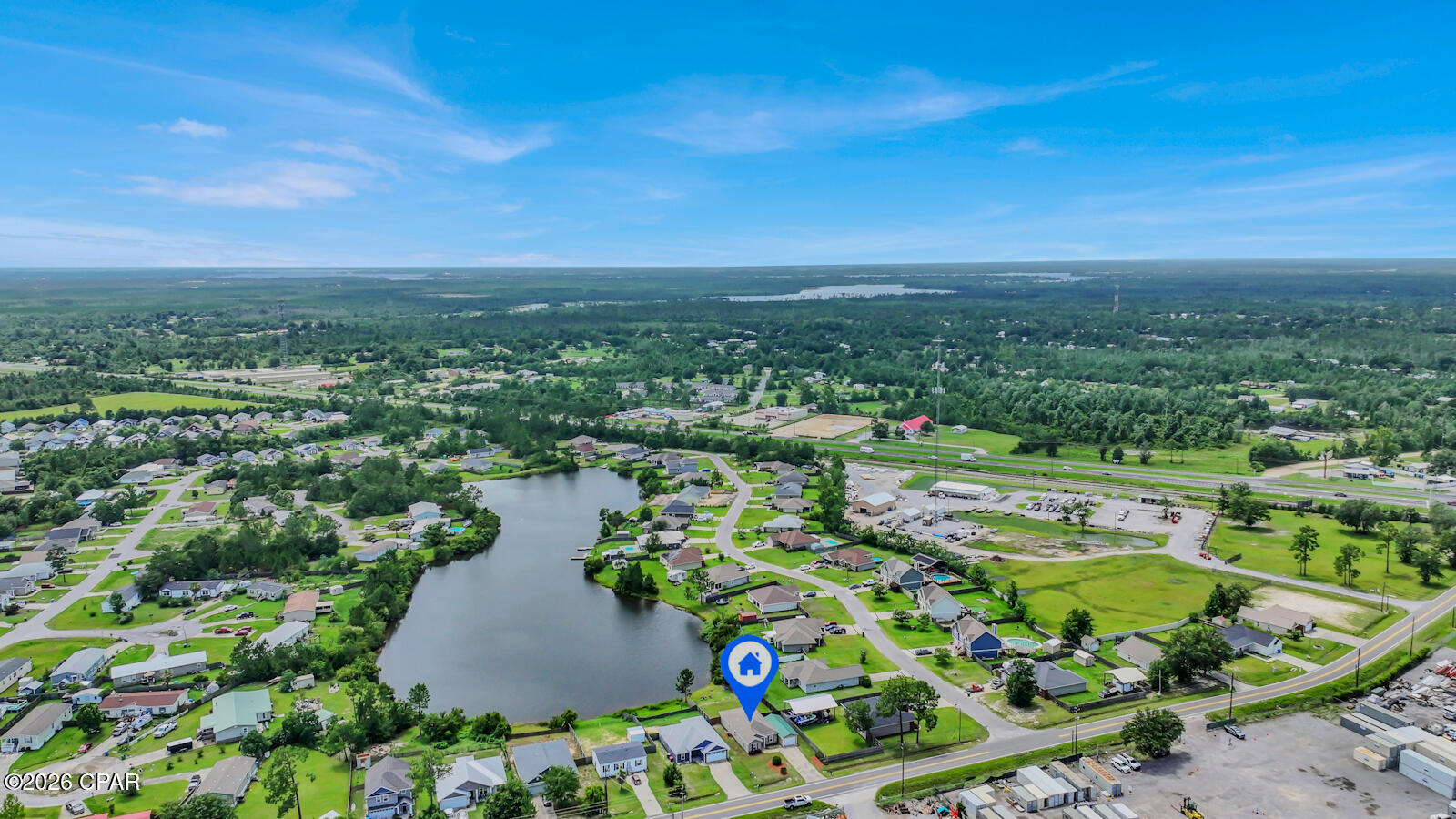 Experience the perfect blend of peaceful waterfront living and everyday convenience in this beautiful home situated on a spring-fed lake. Featuring 9-foot ceilings and an open-concept design, the home offers a spacious and inviting atmosphere from the moment you walk in.

The heart of the home is the stunning kitchen, complete with a large center island, ample cabinet space, and plenty of room for gathering with family and friends. Large windows showcase serene water views and fill the home with natural light.

Step outside and enjoy fishing right from your backyard, or take a short drive to nearby Deer Point Lake for boating, fishing, and endless outdoor recreation. Conveniently located just 10 minutes from the center of town and only 5 minutes from shopping, restaurants, and everyday essentials, this property offers the lifestyle you've been looking for without sacrificing convenience.

Whether you're enjoying your morning coffee overlooking the water, spending afternoons on the lake, or hosting friends and family, this home is designed to help you make the most of Florida living.