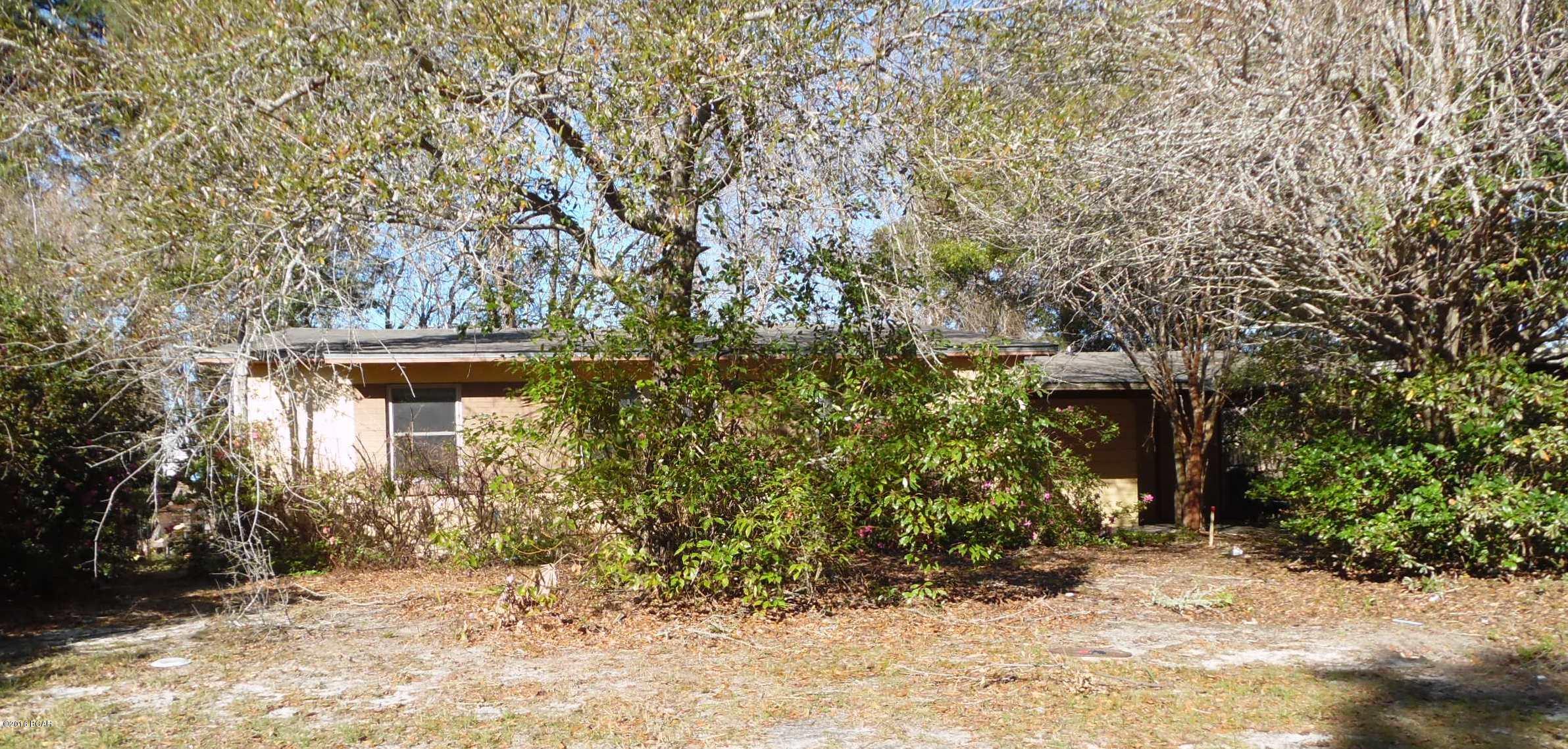 Here's a great opportunity to own a 3 bedroom house in downtown Panama City,  close to government offices, trolley route and schools, in an area of similar homes.   This home boasts a lovely yard, in with healthy, blooming azalea bushes.  There's a large screened porch on the rear of the home, great for get togethers and the interior has 2 living areas and a large kitchen.  The bathroom is HUGE, with a hottub that conveys with the property.  (All info is approximate and anything important should be verified by the buyer.)