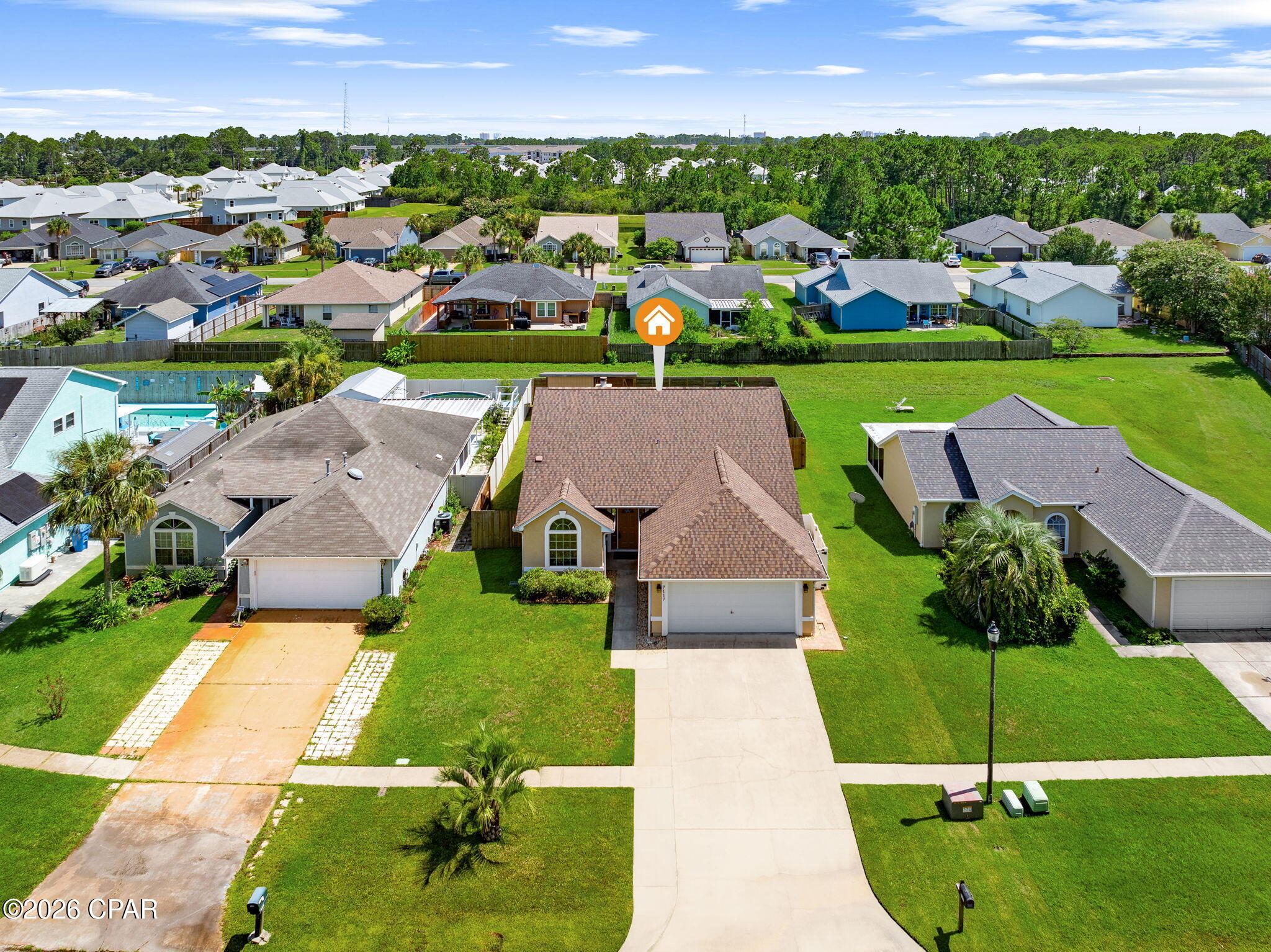 If you would like an immaculate and very handsome home close to the Naval Support Activity base in PCB, you are in luck!  7117 Brandywine Drive has a split plan with a great layout including an 18 x 24 living/dining combination space, a 14 x 16 Primary Bedroom, a 2-car garage and a large fenced in yard. It is in a prime spot close to the Hathaway Bridge which means it is near fabulous eateries, sports parks, St Andrews State Park and a beautiful beach.  You have the best of both worlds with a ''relaxed'' HOA that is only $ 225 annually (which equates to less than $19 monthly to keep up the common areas.)  The home has recently been painted- The pretty 12 mm laminate flooring makes a definite statement along with gorgeous quartz countertops, a farm sink, and extra cabinetry in the kitchen.  A 10 x 18 outdoor workshop with shelving and open cabinets should seal the deal. 
If you have your own VA eligibility, you could possibly assume the loan balance with a 3.5% interest rate.  The difference between the assumption and the purchase price though would need to be considered as it would need to be paid at closing along with the Buyer's customary costs to close- Square footage was verified from a VA appraisal report in December of 2017 as 1537 sq ft of heated and cooled.