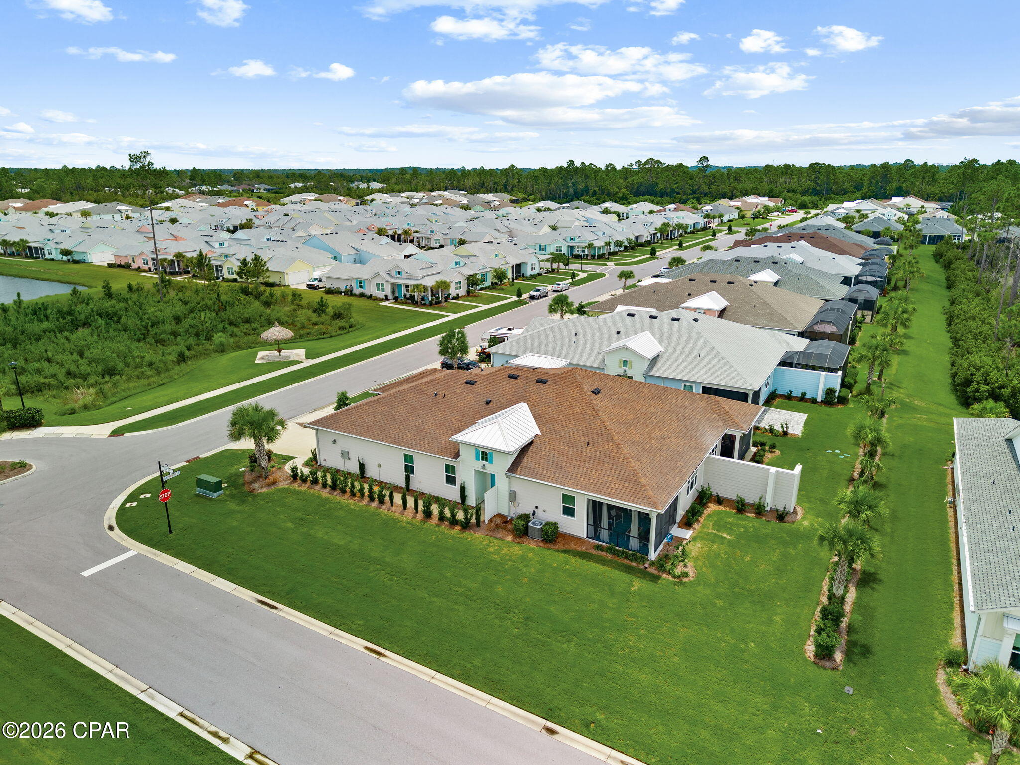 ANTIGUA Villa in desirable Phase 4 of Latitude Margaritaville Watersound! Why wait for new construction when you can move right into this beautifully upgraded Antigua Villa, perfectly positioned on a premium corner lot directly across from the Phase 4 mailboxes? This is one of the most convenient locations in the community, just a quick golf cart ride to Town Square, the incredible resort amenities, and the future marina area. Everything that makes Latitude Margaritaville Watersound so special is right at your fingertips.
From the moment you arrive, you'll appreciate the pride of ownership and thoughtful upgrades that make this home truly stand apart. Every enhancement has been selected to create a home that is both beautiful and functional, offering comfortable everyday living along with the perfect space for entertaining family and friends. 

The home offers an impressive collection of upgrades, including gutters and downspouts, a Wi-Fi garage door opener with a built-in camera, Ninja concrete garage floor coating, insulated garage walls and ceiling, a dedicated 20-amp outlet for golf cart charging, pull-down attic stairs, and floored attic storage above the garage. The upgraded kitchen features 42-inch upper cabinets, pullout shelves and drawers, dovetail construction, soft-close doors and drawers, crown molding, quartz countertops, a 60/40 undermount stainless-steel sink, tilt-out storage at the sink, and LG Smart Wi-Fi stainless-steel appliances, including a refrigerator with dual ice makers and Craft Ice. The primary bath features 12x24 floor tile, a zero-entry shower with a corner ledge and tile extending to the ceiling, upgraded soft-close cabinetry with an additional drawer stack, custom mirrors, quartz countertops, rectangular undermount sinks, and brushed-nickel fixtures.
Location is everything, and Phase 4 continues to be one of the most sought-after areas of the community. You're close enough to enjoy all the excitement without the longer drive from the newest phases, making it easy to hop on your golf cart and head to dinner, a concert, fitness class, or meet friends for an evening out.
Life at Latitude Margaritaville Watersound is about so much more than owning a beautiful home--it's about enjoying a lifestyle that feels like a vacation every day. Spend your mornings in the state-of-the-art fitness center or indoor lap pool, enjoy the resort-style outdoor pool overlooking the Intracoastal Waterway, play pickleball or tennis, explore miles of scenic walking and biking trails, launch a kayak, take a ceramics or woodworking class, catch live entertainment at the Bandshell, or enjoy dinner and drinks at the Latitude Bar & Chill restaurant. There are clubs, activities, and social events happening year-round, making it easy to stay as active--or as relaxed--as you choose. Just outside the gates, the growing commercial district along Highway 79 continues to expand with shopping, dining, medical services, and everyday conveniences.
''Why wait for tomorrow when paradise is already pouring the margaritas today? Grab your flip-flops, leave the lawn mower behind, and trade rush hour for happy hour. Spend your days cruising the neighborhood by golf cart, catching live music at Town Square, relaxing by the resort-style pool, or simply unwinding on your own lanai. Around here, every sunset feels a little brighter, every day offers a new adventure, and life has a way of slowing down just enough to remind you to enjoy the journey. Fins Up...your island-inspired lifestyle is waiting.''
If you've been searching for an upgraded villa in one of the community's most convenient locations, this ANTIGUA deserves a place at the top of your list. Come experience why so many people have chosen to call Latitude Margaritaville Watersound home and start living the lifestyle you've been dreaming about. Buyer and buyer's agent should independently verify all measurements, features, upgrades, and any other information deemed Important.