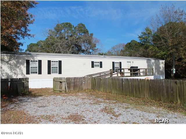 Mobile home on almost 1 acre of land.. This home could be rental income! Rent the mobile home build a house on the land. Seller is looking at all reasonable offers. Mobile home is a fixer upper but can be very cute... call today for your appt to see this home