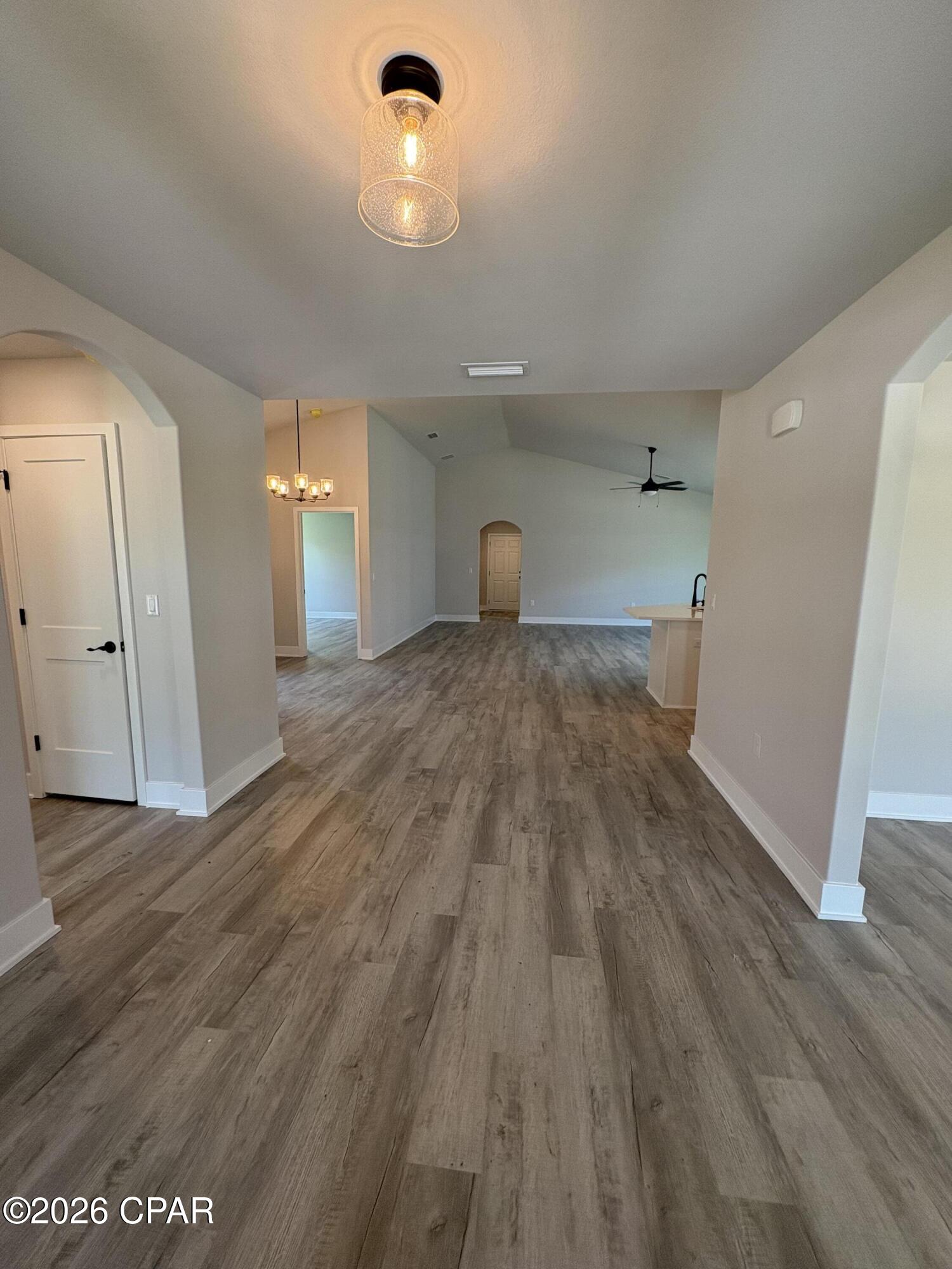 ** 5K IN FLEX CASH PLUS MOVE IN PACKAGE: WASHER,DRYER, FRIDGE & BLINDS**   WATERFRONT COMMUNITY! Step into 2,201 sq. ft. of modern elegance in this stunning 2026 single-story retreat. Located in a premier waterfront community with direct Bay and Gulf access, this home perfectly blends style with daily practicality. 
The heart of the home features an expansive open-concept living area and a chef-inspired kitchen, complete with granite countertops, a large island, and a walk-in pantry. Relax in the private master suite featuring a spa-like en-suite bath and a massive walk-in closet. Durable and beautiful Core Tec Pro Plus flooring flows throughout, offering 100% waterproof protection perfect for coastal living. With energy-efficient construction, a customizable flex room, and a 2-car garage, this home is designed for both comfort and long-term value.
