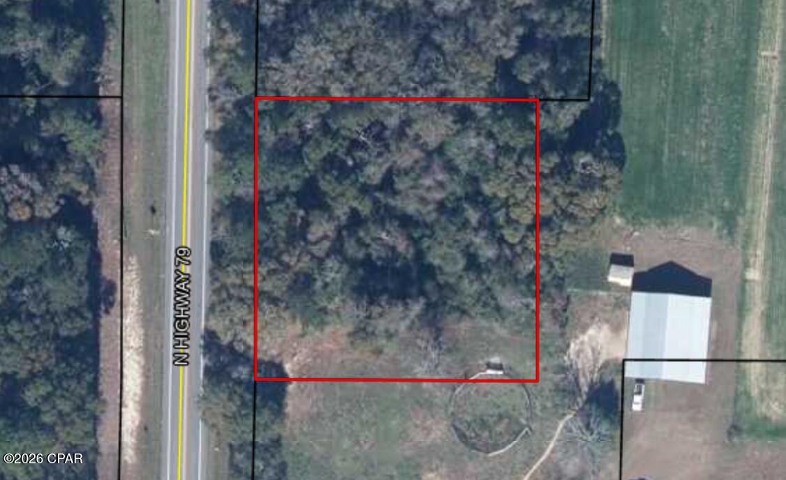 1 Acre Commercial or Residential Opportunity on Florida Highway 79
Unlock the potential of this prime 1-acre parcel located along highly traveled Florida Highway 79 in the growing Esto/Bonifay area. Featuring approximately 210 feet of unobstructed highway frontage, this versatile property offers exceptional visibility and accessibility, making it an outstanding opportunity for commercial development, investment, or residential use.

Whether you're looking to establish a business, expand your existing property holdings, or build your dream home, this raw acreage provides the flexibility to bring your vision to life. Surrounded by the peaceful beauty of rural North Florida, you'll enjoy the serenity of country living while still maintaining convenient access to modern amenities.

Located just about an hour from Panama City Beach, you'll be within reach of world-class shopping, dining, entertainment, and the Gulf Coast's stunning white-sand beaches. Meanwhile, the Highway 79 corridor continues to experience significant growth, with new residential communities, healthcare facilities, and commercial development helping drive future value and opportunity throughout the area.

Don't miss your chance to secure a highly visible tract of land in one of Northwest Florida's expanding growth corridors. Whether for business, investment, or a future homesite, the possibilities here are endless.

Property Highlights:

1 Acre of Raw Land
Approximately 210 Feet of Highway 79 Frontage
High Visibility & Easy Access
Ideal for Commercial or Residential Development
Growing Development Corridor
Approximately 1 Hour to Panama City Beach
No HOA
Endless Potential for Investment or New Construction
Bring your plans, your vision, and your future to Highway 79.
Raw Acreage. All Measurements to be verified by Buyer(s) and/or Byer(s) agent if deemed important.