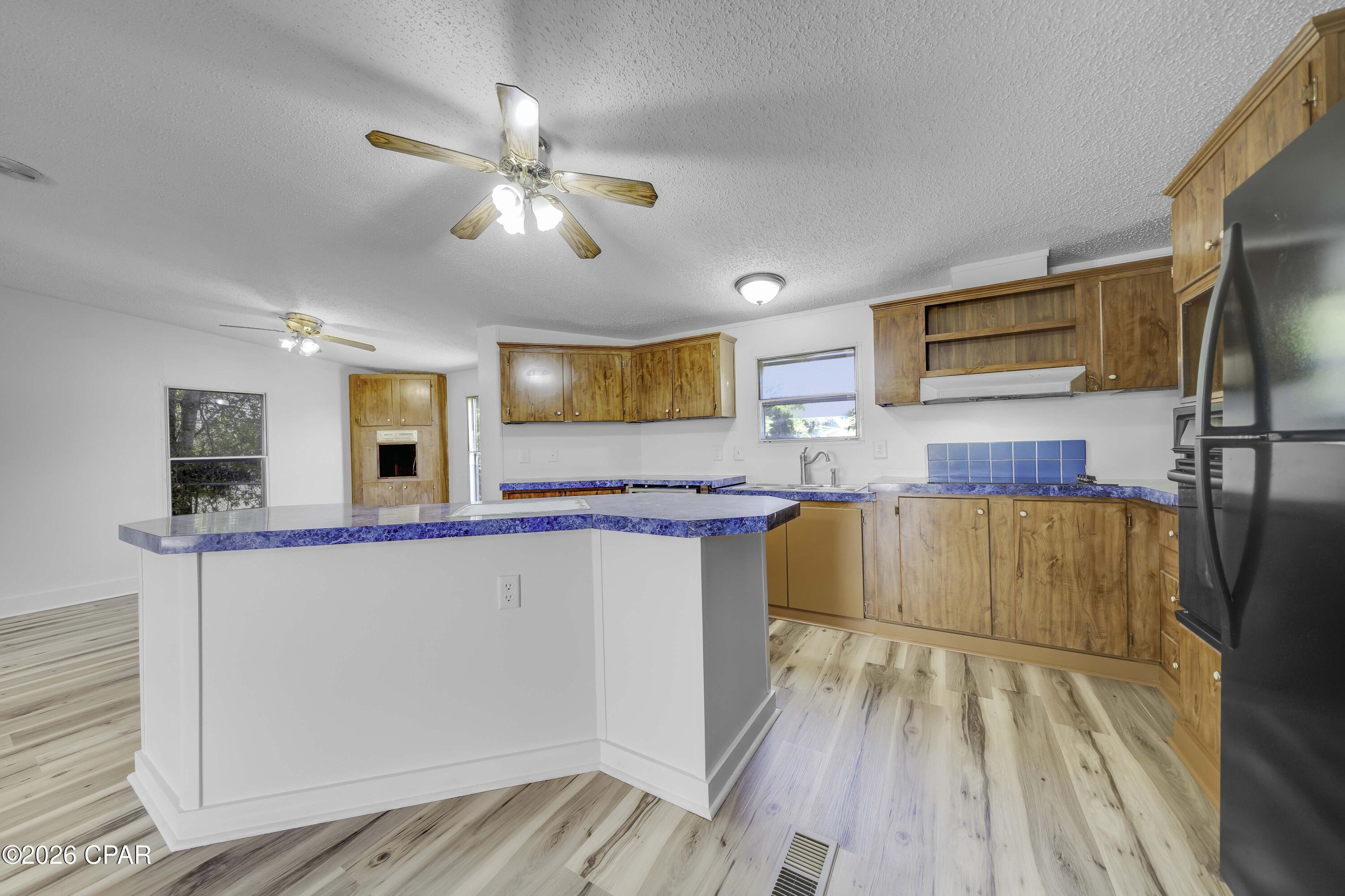 Looking for affordable living with a great location? This charming 3-bedroom, 2-bath mobile home offers the perfect blend of comfort, convenience, and value. Located just 7 miles from Tyndall Air Force Base and only 20 miles from the sugar-white sands of Mexico Beach, you'll enjoy easy access to work, shopping, dining, and some of the Gulf Coast's best beaches.

Inside, you'll find a functional layout with plenty of space for everyday living. The spacious kitchen features abundant counter space and ample cabinetry, giving you plenty of room for meal prep, storage, and entertaining. Outside, the large backyard includes a storage building, providing even more space for tools, lawn equipment, or seasonal items.

Whether you're looking for a peaceful place to call home or a convenient location close to the area's top destinations, this property offers everything you need. Schedule your showing today!