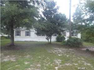 Large 3 bedroom 2 Bathroom manufactured home on an acre lot on a private road offered as is. The home needs some TLC but features all appliances, and a large master bedroom and bath with separate shower and double vanity. All sizes are approximate please verify accordingly.