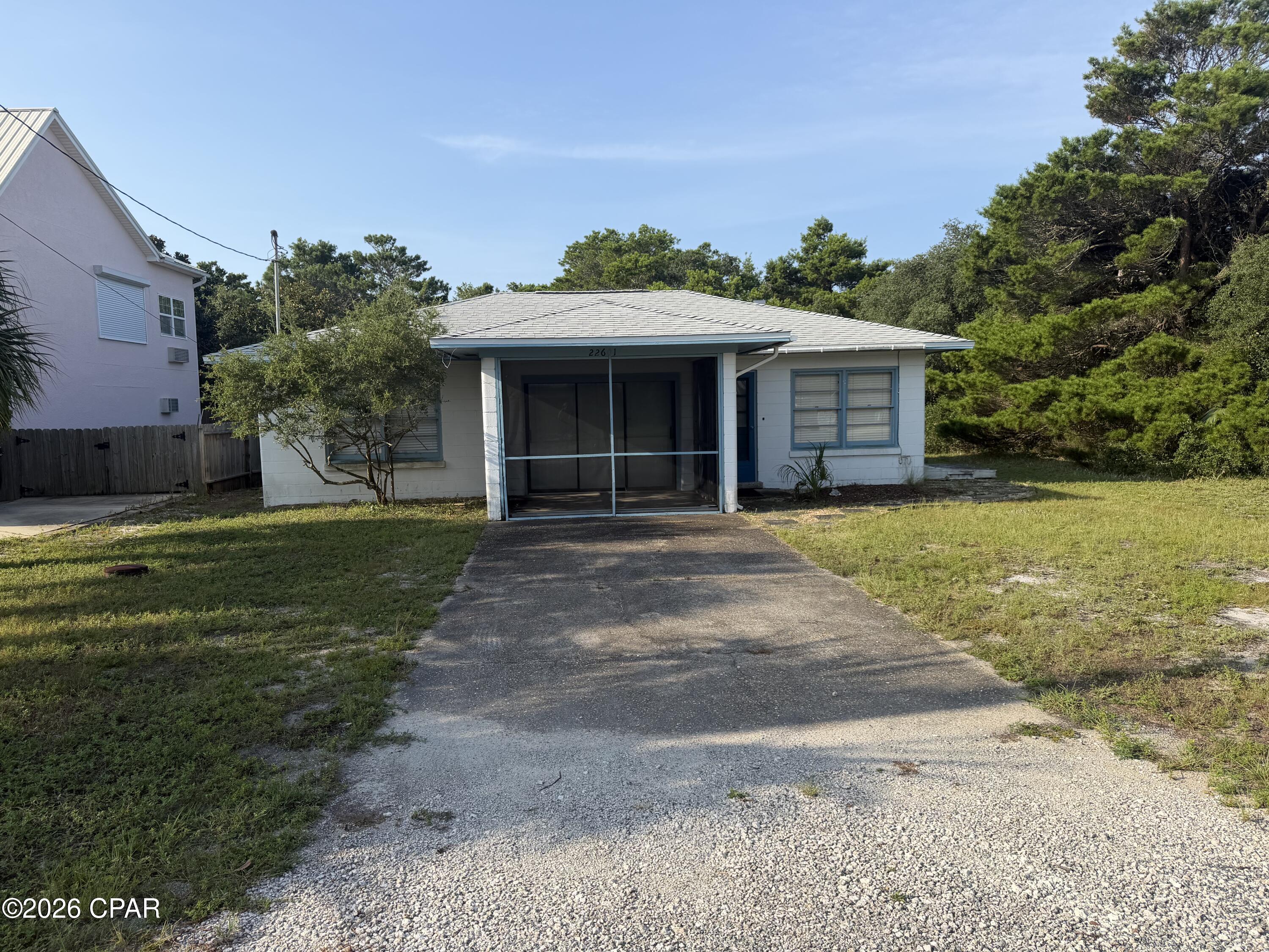 Timeless Coastal Charm with Rich History - 22601 Coral Drive, Panama City Beach, FL

Step into a truly one-of-a-kind coastal home where character, quality, and thoughtful updates come together. Originally built in 1956, this well-maintained residence showcases beautiful terrazzo floors throughout and rare old-growth wide-plank pine paneling on the ceilings and interior load-bearing walls, creating warmth and timeless appeal that is difficult to find.

Over the years, the home has been lovingly cared for and extensively improved, including:

New roof (2019)
New HVAC system (2022)
Electrical panel updates and rewiring
Whole-home replumbing
New water heater
Trex rear deck
Updated gutters
Hurricane-strapped storage shed
Grounded electrical outlets
Recent home inspection completed
The property weathered Hurricane Michael with only minimal damage, followed by repairs and improvements, providing added peace of mind.

Additional features include:

Screened carport/flex space
Spacious rear deck perfect for entertaining
Storage shed
City water and septic system
Former well still on the property with potential for irrigation
Original windows that have been professionally reglazed, with several panes replaced
The current owners have carefully documented the home's history, maintenance, and improvements, offering buyers a rare level of transparency and confidence.

Whether you're looking for a primary residence, vacation retreat, or investment opportunity, this home offers classic Florida charm, solid construction, and numerous major system updates--all just minutes from the sugar-white beaches, dining, shopping, and entertainment that make Panama City Beach such a sought-after destination.

Come experience the character, craftsmanship, and history of this special Panama City Beach home--properties like this don't come along often.