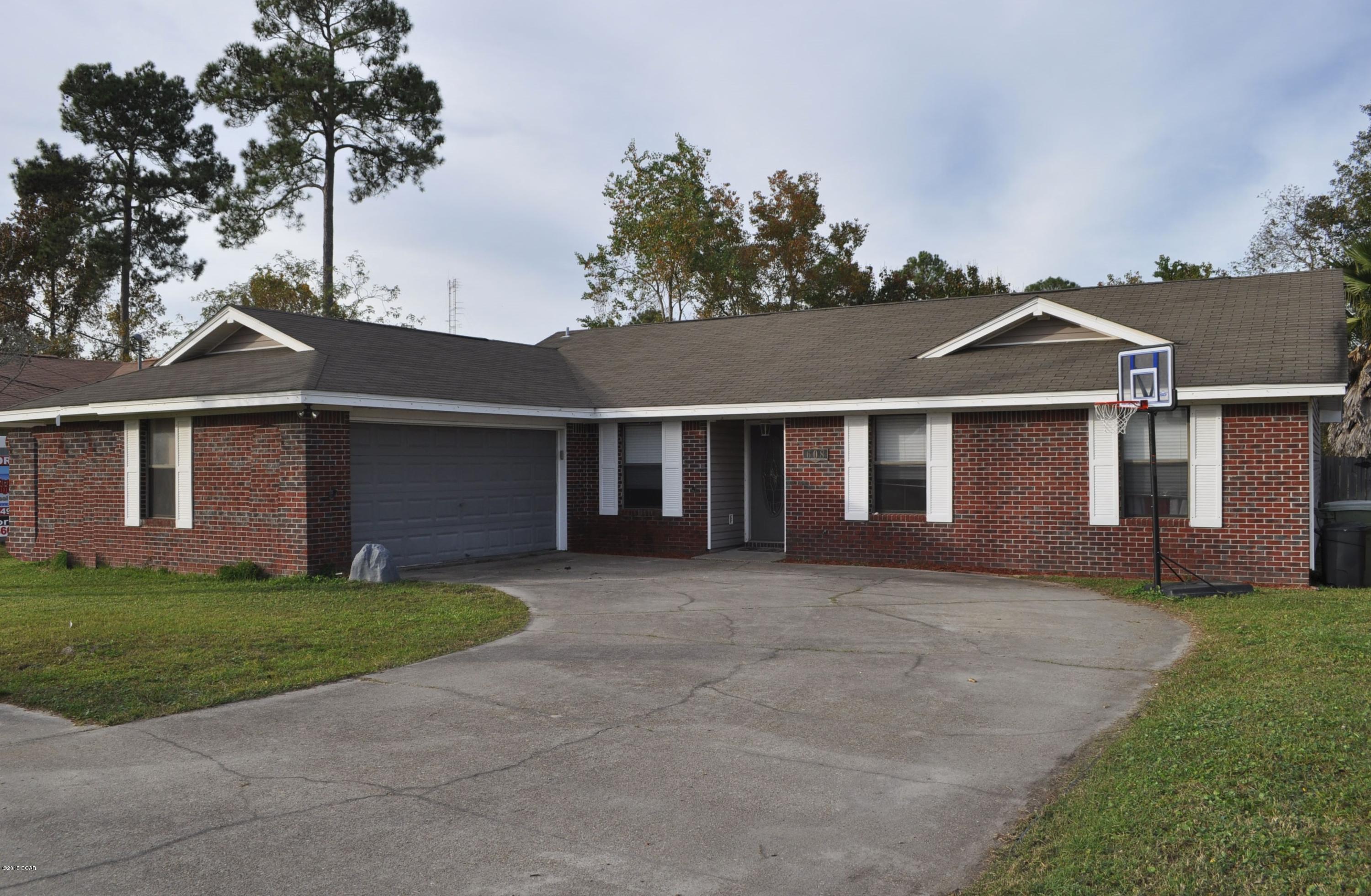 Charming Lynn Haven home perfect for first-time buyers! This attractive 3BR/2BA Pine Forest Estates abode features an open-floor plan with extra large living area, low maintenance ceramic tile flooring throughout, and both baths have been recently updated with new vanities.  You'll enjoy having a very roomy privacy fenced backyard where the kids and pets can play safely and there are sidewalks throughout the neighborhood.  There is also a two car garage and abundant storage space.  The home is convenient to schools, shopping and entertainment and it's an easy commute to all military bases.  All info is approx. and must be verified by Buyers if important.