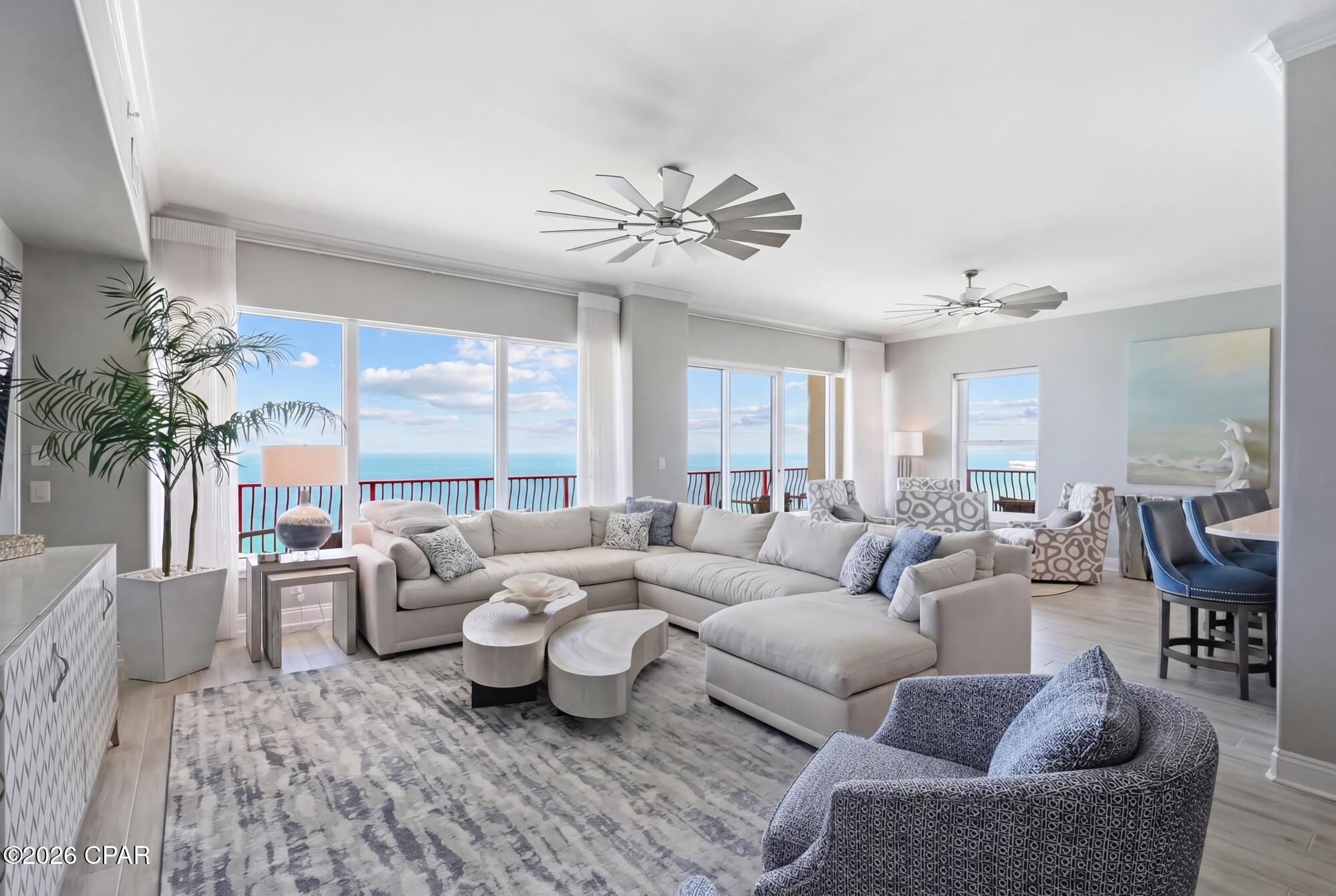 Welcome to an extraordinary coastal retreat in the highly sought-after Hidden Dunes condominium in beautiful Panama City Beach. This rare 3-bedroom, 3-bath residence spans over 2,300 square feet and has been completely renovated and thoughtfully redesigned to deliver a refined, luxury living experience on the Gulf. From the moment you enter, you're greeted by elevated 10-foot ceilings--exclusive to just the top two floors in the building--creating an airy, expansive feel that perfectly complements the breathtaking, unobstructed Gulf-front views. Every detail has been curated with high-end finishes, paired seamlessly with luxury designer furnishings and décor, offering a sophisticated yet relaxed coastal aesthetic.

The showstopper is the expansive wrap-around balcony, where indoor-outdoor living truly comes to life. Enjoy panoramic views of the emerald waters while entertaining, relaxing, or unwinding in your private hot tub as the sun sets over the horizon.

This exclusive gated Gulf-front community offers a serene and private atmosphere, along with resort-style amenities including a community pool, fitness center, pavilion/gazebo, and BBQ grilling areas--perfect for enjoying time with family and friends.

Whether you're seeking a full-time residence or a luxurious second home, or investment opportunity, this exceptional Hidden Dunes condo delivers the perfect blend of privacy, elegance, and coastal beauty--all in one of the most desirable locations along the Gulf Coast.