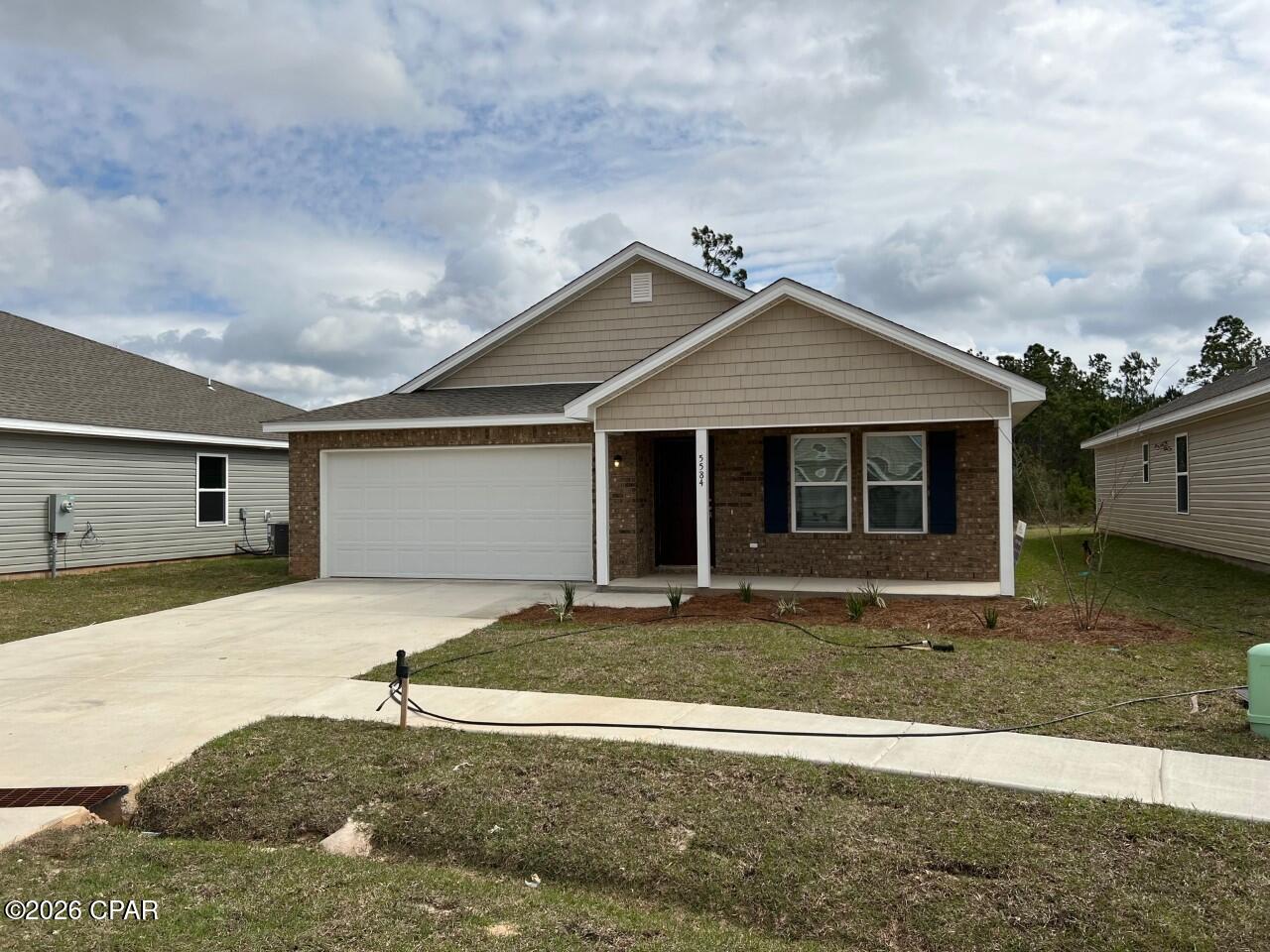 Beautifully situated in the Butler Farms Community, this well-maintained 4-bedroom home is tucked away on a quiet cul-de-sac and conveniently located near Tyndall Air Force Base—making it an ideal option for first-time homebuyers, military families, or investors.

The home features an open-concept layout that seamlessly connects the living, dining, and kitchen areas, creating a bright and inviting space perfect for everyday living and entertaining. The kitchen is thoughtfully designed with attractive cabinetry, granite countertops, and stainless-steel appliances, including a range with microwave hood and dishwasher. A washer and dryer are also included for added convenience.

The spacious primary suite offers a private en-suite bath complete with dual vanity sinks and a walk-in closet, providing both comfort and functionality. Step outside to a backyard that offers a blank canvas for customization, backed by a peaceful wooded area that adds privacy and a serene setting.