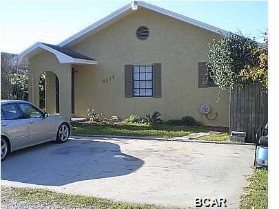 Very nice home with ceramic tile and carpet, breakfast bar, open floor plan, washer and dryer connections, split bedroom plan, and close to work shopping and beach!