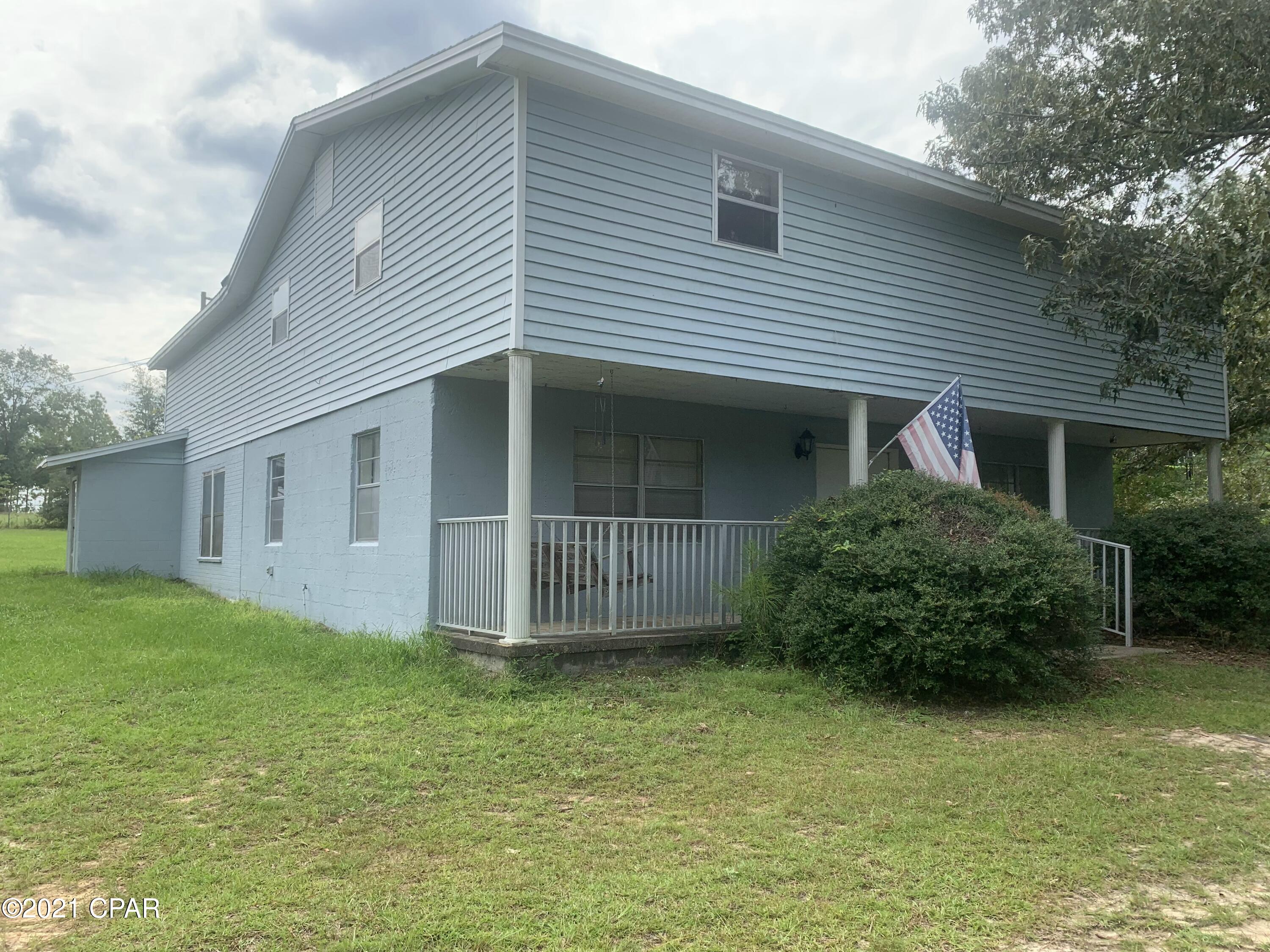 PRICE REDUCED by 10K!!!!! THIS HOUSE IS HUGE!! - 5BR/3BA 4,000+SqFt sitting on 1 acre!! VERY MOTIVATED SELLER! Make an OFFER!! New Roof in 2019. Fenced-in yard, Koi Pond, above ground pool and 900 sqft shed with power access. 35 minutes from Pier Park and PCB Beaches. Nearby Elementary and High Schools. Close to Cypress Springs and Pate Pond Lake as well as the Seacrest Wolf Sanctuary. Buyer to verify all measurements.