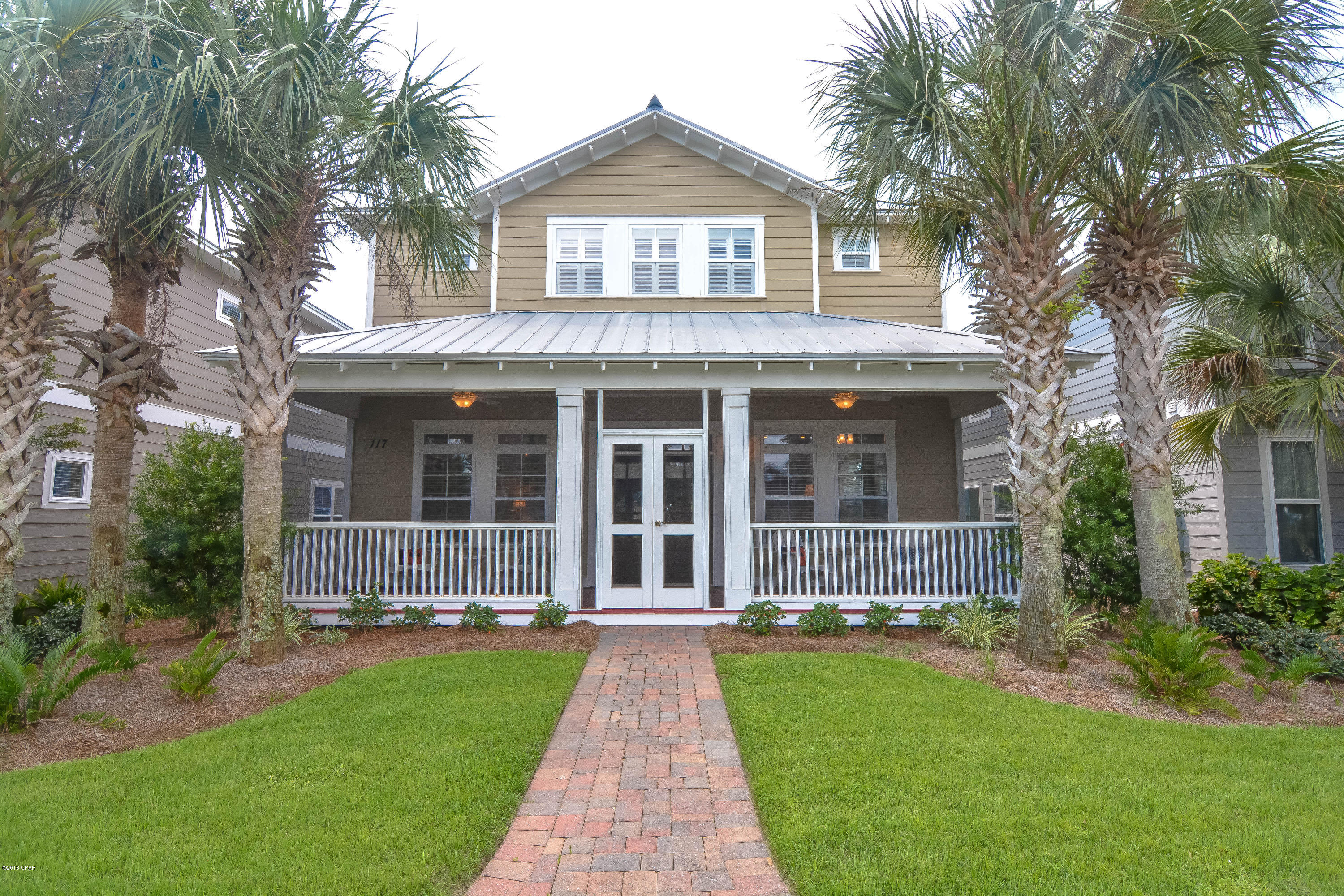 Amazing west end property perfect for families or a second home!This property offers top of the line amenities. This property has had the following features added recently: Screened in front and back porches, a new garage door, added walk-in pantry,newly pained porches,plantation shutters and more. Throughout this Florida cottage you have tray 10 ft ceilings, crown molding, and recessed lighting to go along with the open concept. Throughout the kitchen you have beautiful wooden cabinets and granite counter tops. Next to the sitting area you have a fireplace and wet bar perfect for get-togethers. Upstairs you have the Master and two additional bedrooms with ample living space, each bedroom has its own bathroom as well!