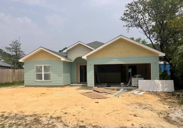 Welcome to your brand NEW home in Panama City Beach. This 3 bedroom 2 bath PLUS an office is currently under construction w/completion date mid to late June. Hardy siding, pull down attic access from  2 car garage, wood look tile throughout, granite countertops in kitchen & bathrooms. Open living concept and split floor plan with master separate from guest bedrooms. Master bedroom will have it's own tank less hot water heater. Broom closet off laundry room and walk in pantry in kitchen * pictures are from another home only to show quality, flooring & granite** Floor tile is Duttonwood Ash * Granite is Brown Fantasy * Exterior color Carolina Blue * Front yard sprinklers run off city water * front yard will be sodded * Privacy fence is an add on cost * see feature list for more details