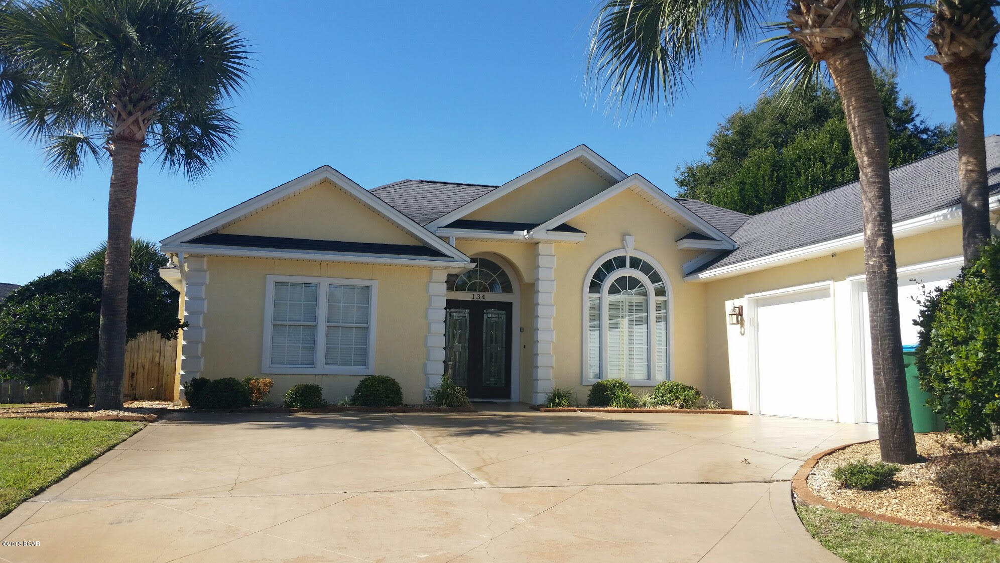 Welcome Home to your Beautiful 3 bedroom, 2 1/2 bath home located just blocks from the beach in the very desirable Summer Breeze subdivision. Features include gas fireplace, 10' ceilings, crown molding, formal dining room, and tile through out except bedrooms. Trey ceiling in master bedroom with the master bath having a double vanity, separate shower and whirlpool tub. With the heated pool, landscaped yard, privacy fence and a two car garage, you have everything you need to call this ''Home Sweet Home.''