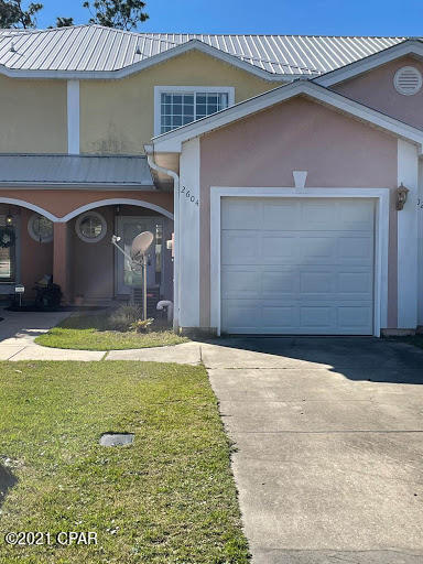 Lovely 3 bedroom 2.5 bath townhome. Great location off 26th St. in Lynn Haven . Just repainted. Large master suite. Separate shower and tub. Small fenced yard. One car garage. Must See! No Pets. .