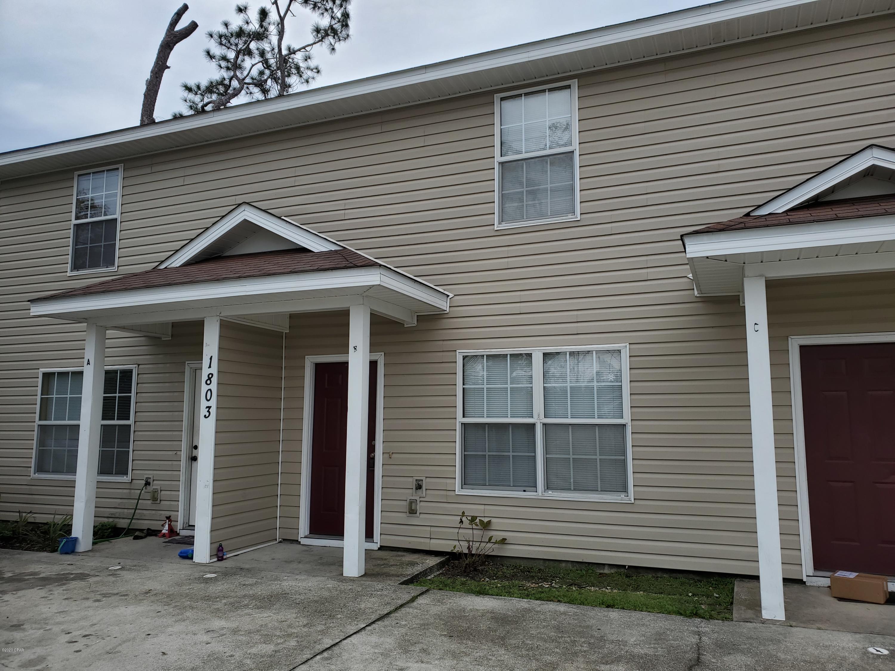For rent! Two story town home with 2 bedrooms, 1.5 bath in St. Andrews area. First floor has open concept with large living room, half bath, dining and kitchen with ceramic tile flooring. Kitchen includes refrigerator, stove/oven, dishwasher, and microwave with great counter space and cabinet storage. Laundry room on first floor and back door access to patio and open yard. Upstairs is carpeted with two bedrooms and bath with tub/shower combination. Call today to view this town home centrally located in Panama City! **Pets negotiable upon approval with non-refundable $250 pet fee. Rental application required for any one 18 or older.