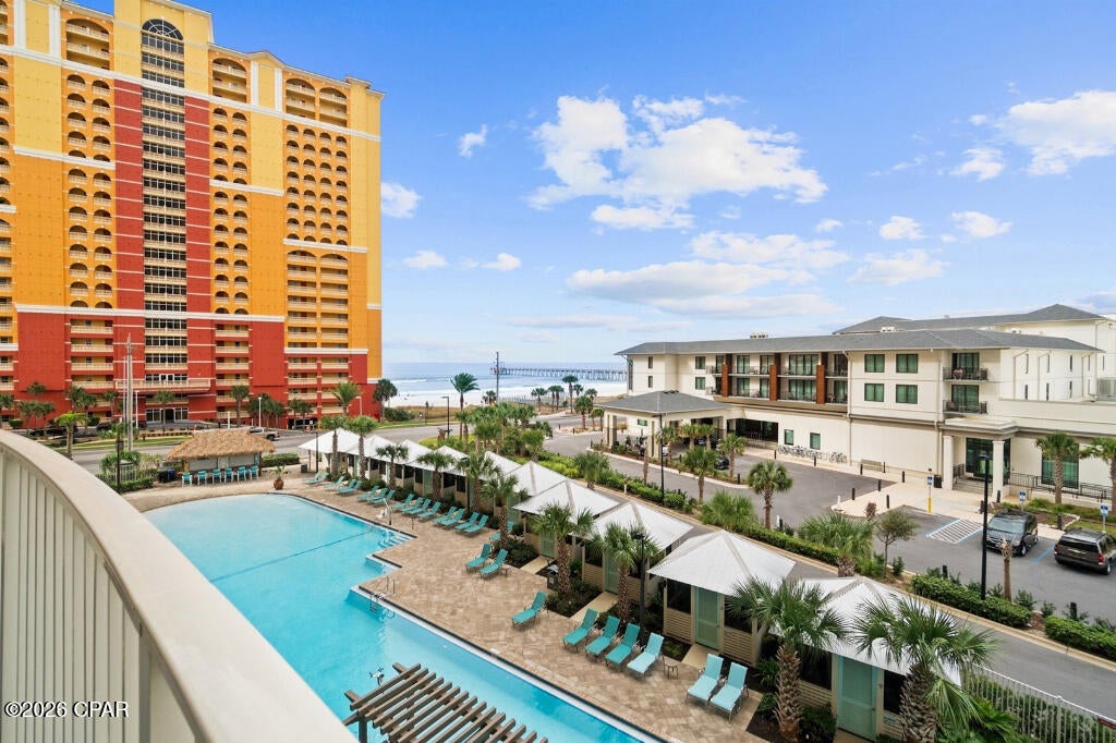 Enjoy beautiful ocean and pier views from this spacious 2-bedroom, 1-bath unit with approximately 1,000 square feet of living space. Step onto the impressive 200-square-foot balcony through sliding glass doors from both the primary suite and living room, creating the perfect spot to relax and enjoy the coastal scenery. The interior features tile flooring throughout, an eat-in kitchen, and a comfortable living room overlooking the ocean. The primary bathroom offers a stand-up shower and double vanities, while additional features include a walk-in closet, large laundry room, and private owner's closet.

Enjoy the convenience of a weather-free location--park in the secure parking garage, take the elevator, and the unit is conveniently located just off the elevator with no need to venture outside. Enjoy access to the private beach and an incredible location within walking distance of Pier Park, shopping, dining, and entertainment. Priced to sell fast--don't miss this opportunity to own your piece of paradise!