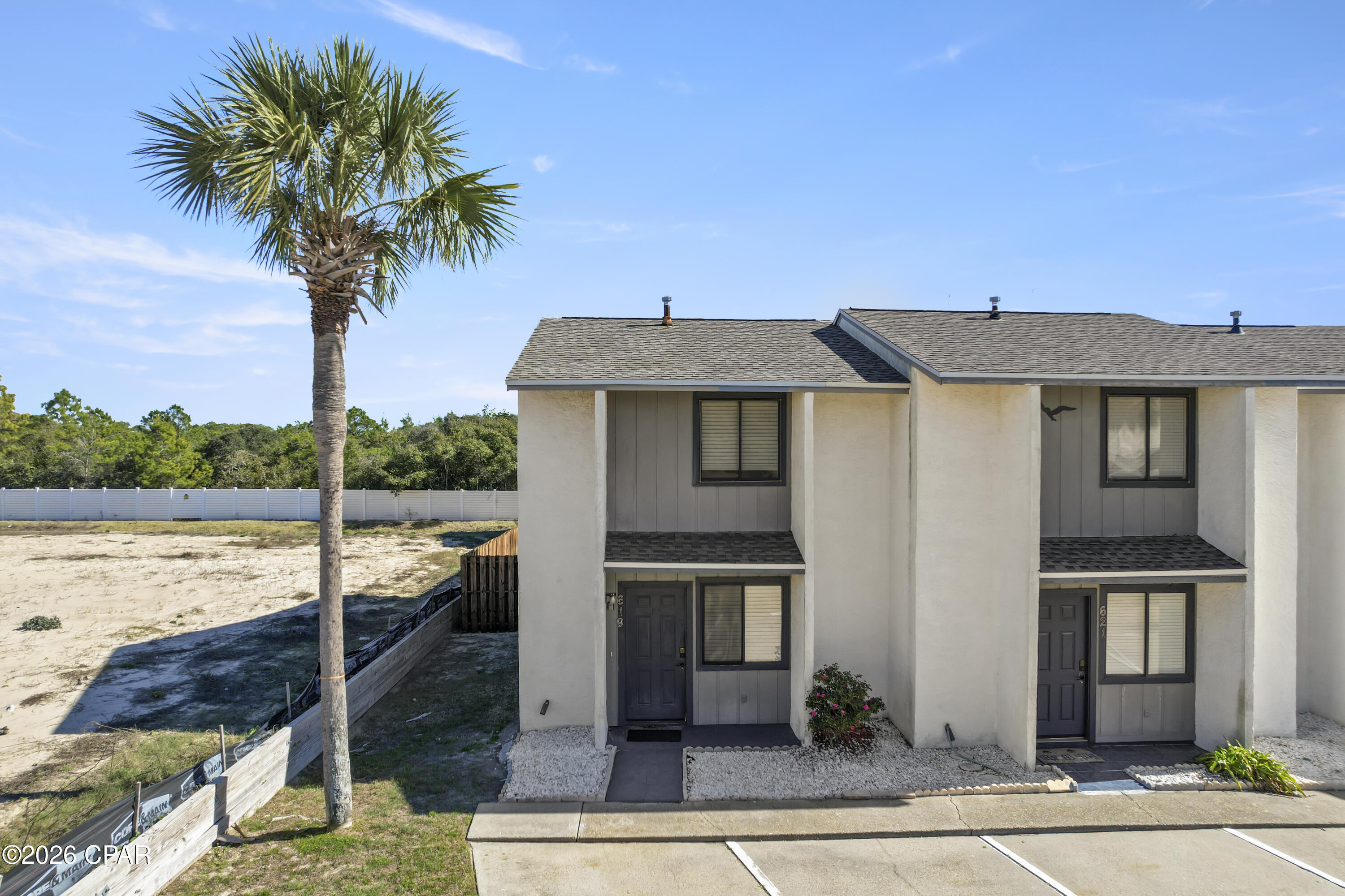 Welcome to 619 Laurel Street in Panama City Beach! This 2 bedroom, 1 bath attached townhouse offers an excellent opportunity for a primary residence, second home, or short term rental investment, with STRs allowed. Centrally located in Panama City Beach, this unit provides easy access to the beach, shopping, dining, and entertainment, making it an attractive option for both owners and guests. The functional floor plan offers comfortable living space, two well sized bedrooms, and a layout that's easy to maintain ideal for full time living or rental use. Situated in an established area of PCB, this attached single unit delivers affordability, flexibility, and income potential in one of the most desirable beach markets on the Gulf Coast. Whether you're looking to live near the beach or generate rental income, this property checks the boxes schedule your showing today!
