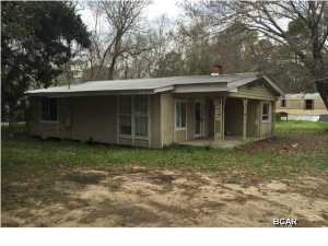 This property is located close to the Bay, where there is great fishing & is convenient to boat ramps. The property has both a detached single family home and trailer on the lot (2 BR and 1 bath). No title or warranty is presently available for the trailer. This property has the potential to be made into a nice home or getaway. The location is close enough to town to avoid long commutes but on the outskirts of the busyness of town, so one can enjoy a serene setting.