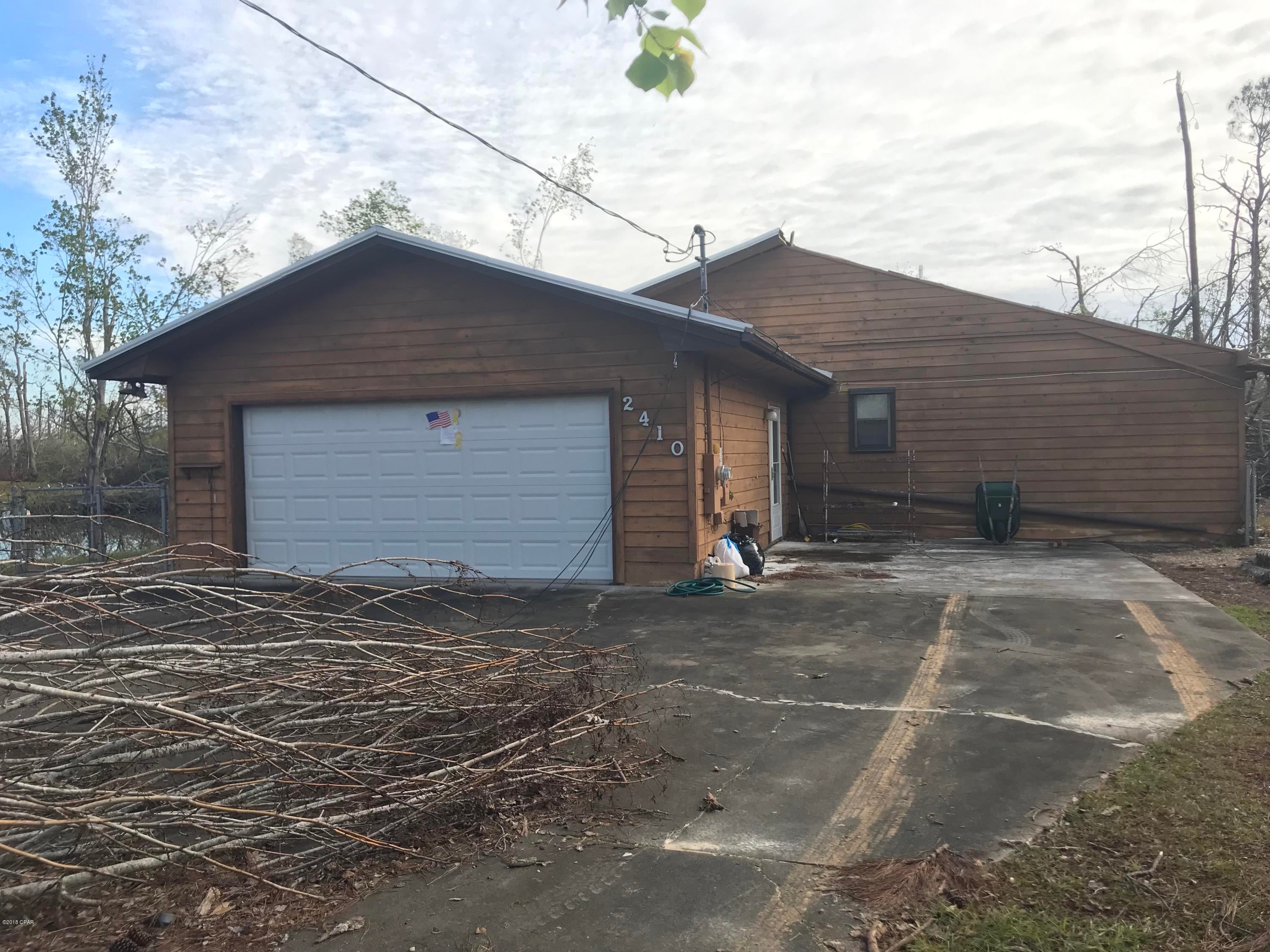 Investor special ! A beautiful home with a 1.2 acres of land and a private POND.The home has roof damage which has been partially fixed. Ceiling needs repair. The home has a beautiful fireplace inside and has a nice kitchen with an island in the center. This home is sold as-is. Cash buyers only. Contact listing agent for more information.