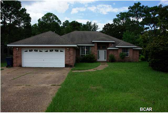 Beautiful all brick home located on a fabulous cul-de-sac in the heart of Panama City. This home features 3 bedrooms with a large master and oversized master bathroom. This bathroom has double sinks, stand alone shower, walk-in closet and whirlpool tub. The other two bedrooms are very roomy with large closets. The kitchen features a gas range and an eat-in area that opens to a large covered patio. There is also a formal dining area, large living area, and double car garage. This home uses gas for heating, range, water heater and clothes dryer. The outside has mature landscaping with an irrigation system.