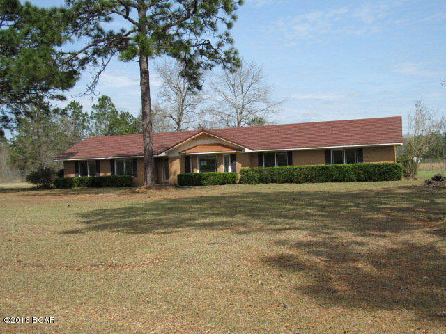 Large beautiful brick home in the country on 2.588 acres of land with inground pool! The home features nice hardwood floors, a large open airy living, dining and kitchen area. The kichen is fully equipped with electric smooth surface range, microwave, dishwasher and side-by-side refrigerator-freezer. The garage has been turned into what may be utilized as another bedroom, a game room, hobby room or a den.