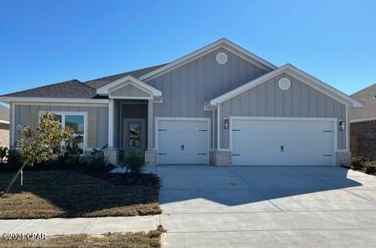 Welcome to Titus Park! The Camden floor plan is full of space with an appointed dining room, a large study, 4 bedrooms and an additional garage for a third car or golf cart. As you enter this home, you will find LVP flooring throughout the common areas and plush carpet in the bedrooms. Just off the foyer, you will find two bedrooms

with a shared bath, double sink vanity and shower tub combo. Trey ceilings are in the dining room, large living room, the study and bedroom 1. Bedroom 1

features a large bath with a garden tub and separate shower as well as a large walk-in closet. The kitchen has a center island with a sink, plenty of beautiful

cabinetry, a corner pantry and appliances which include a stove, microwave, and dishwasher. Pictures may be of similar, but not necessarily of subject property, including exterior and interior colors.

This home is being constructed with the Zip Sheathing system, providing greater protection than a traditional housewrap from
damages due to wind, rain, and extreme weather.

A standard Smart Home package includes a KwikSet keyless entry, Skybell doorbell, automated front porch lighting, an Echo
Dot device, and Quolsys touch panel which can be integrated to control your lighting, thermostat, front door and so much more.
A builder 10-year structural warranty is also included.