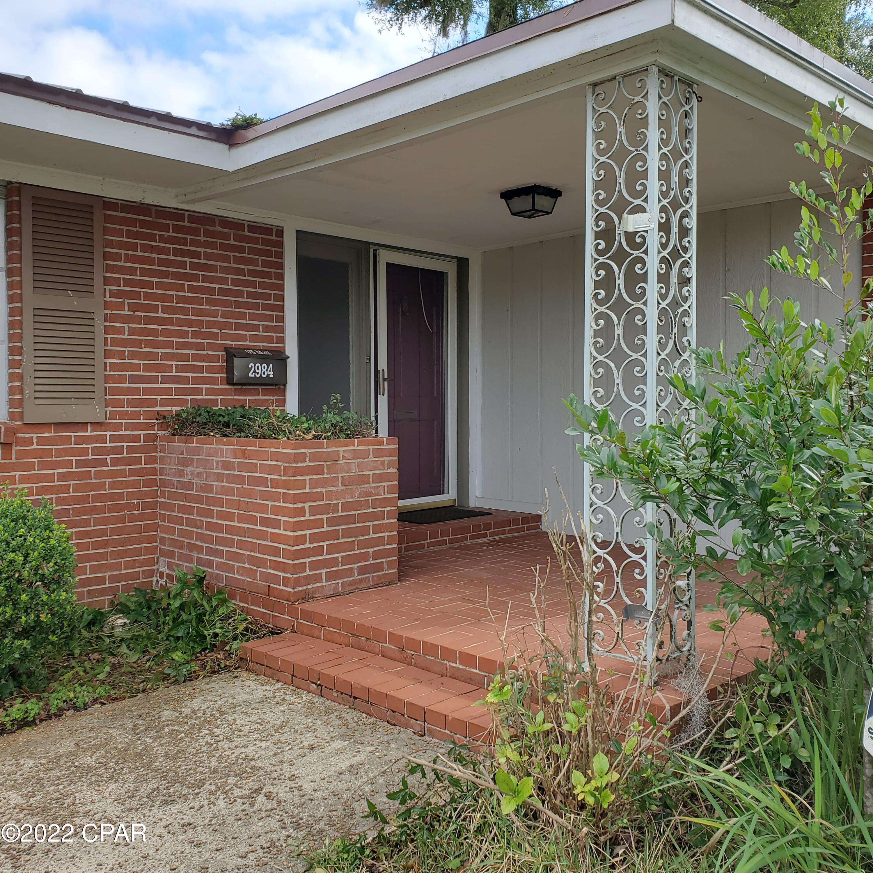Beautiful 3/2 Home with over 2000 sq feet heated and cooled, in the heart of Marianna.  There is so much space in this home.  Hardwood floors large rooms and a great kitchen with lots of cabinets! Large oversized Living Room PLUS a large Family Room with a Fireplace and lots of windows that you can watch the family enjoying the  beautiful In Ground Pool. The large wooden deck and the open carport with as swing and plenty of space to enjoy watching your family and friends enjoy the pool and outside area.  Large workshop with storage for pool equipment, and a large Green House. This great area of Marianna is convenient to Chipola College, Jackson Hospital and Shopping!  What a great place to call your Home!!