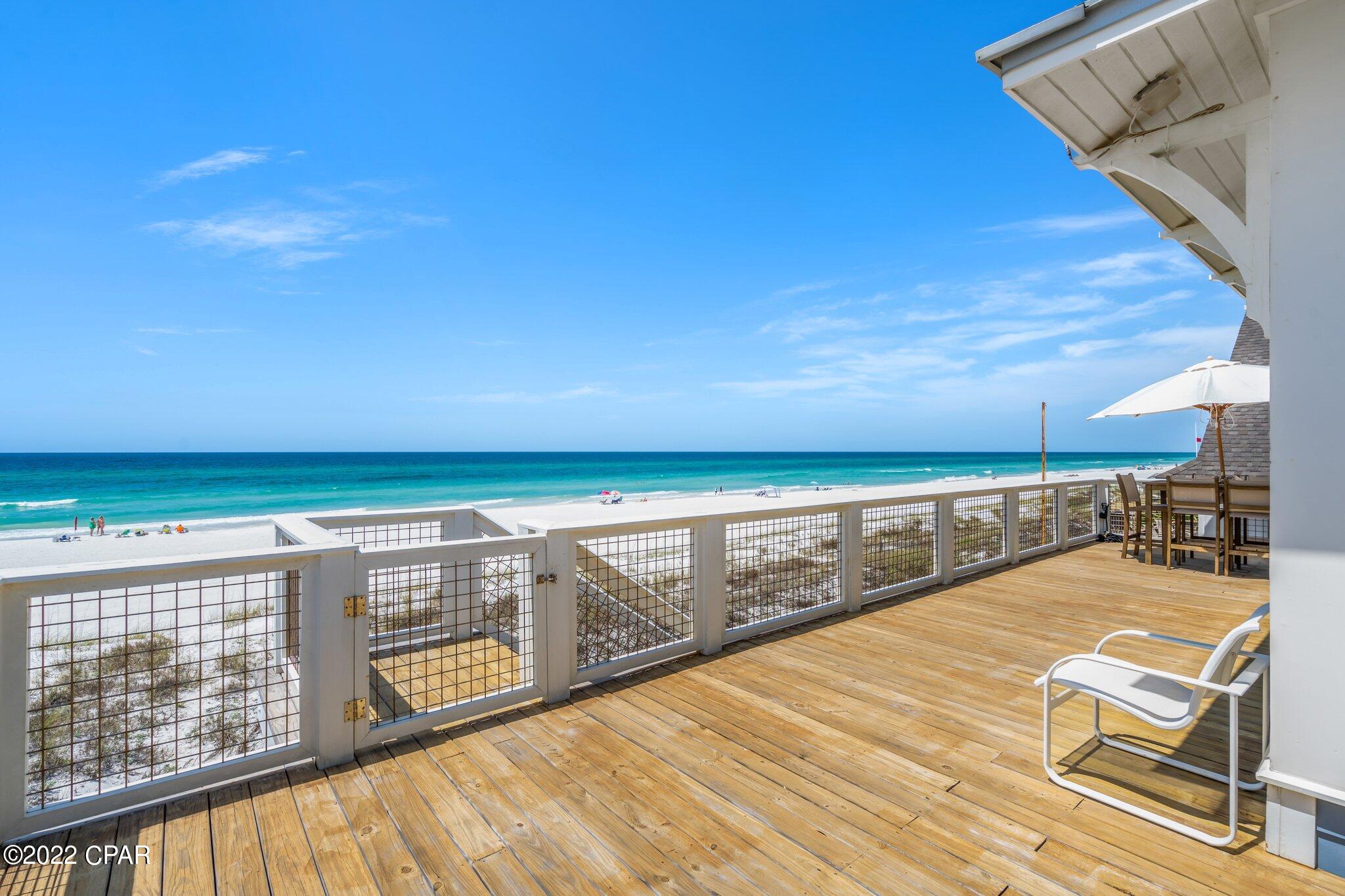 .Complete renovation of Gulf front home on 50ft x250ft lot. Gulf views from most rooms including primary bedroom, secondary, living room, kitchen & from over 2000 sq ft of balconies & decks. Italian Carrera marble in kitchen & bathrooms, new Viking appliances, flat screen TVs, security system with cameras, smart home lighting & automation from Control 4. High-end designer materials throughout: Kohler Newport Brass, Ann Sacks & Aguayo tile. Living area & kitchen features several 200 year-old hand hewn salvaged beams. Renovations include all new hurricane impact windows, oak floors, new 5 ton HVAC, plumbing, wiring, hurricane strapping, new metal roof, solid shiplap interior walls, exterior siding, all new insulation & all  sealed decking has been replaced. Mostly furnished and move-in ready