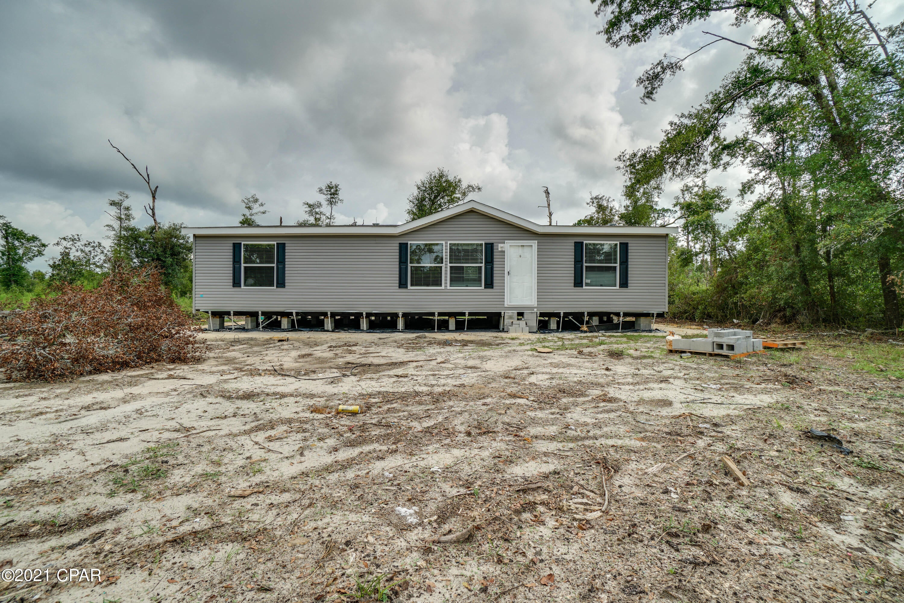 Check out this cozy three-bedroom, two-bathroom home. The open concept kitchen to living room provides a welcoming space for the whole family to enjoy. This home has brand new vinyl floors throughout with carpet in the bedrooms.
