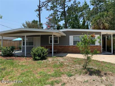 This beautiful home is located in Woodlawn, one of Bay Counties most sought after neighborhoods just west of the Hathaway Bridge - allowing you immediate access to Panama City and Panama City Beach! Location is just minutes from NCSC (Navy Base). This home has tile floors throughout, updates in kitchens and baths and a beautiful fenced back yard with TREES! You have a large carport and a cute courtyard, as well as a bonus room that would serve nicely as an office AND a separate craft room or workshop off the laundry room! Plenty of space for your family and toys. Small pets ok with Pet Fee.

Property is Occupied NO stopping at property - Must call office for apt..
