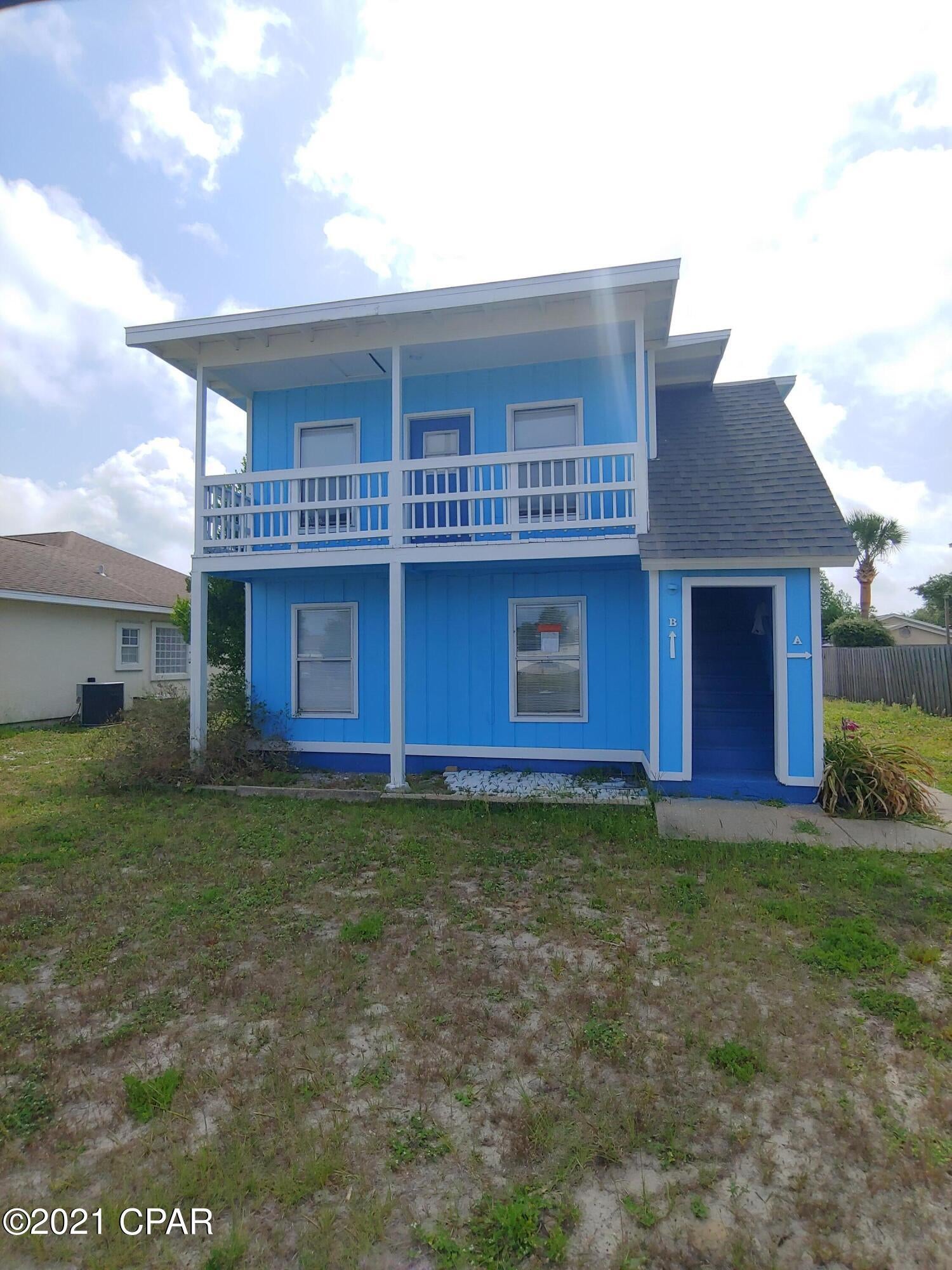 Investor Alert! Duplex available in a convenient area of Panama City Beach with peek-a-boo view of the gulf. This home needs major renovation but when finished should command a great income. New roof in 2019, Upstairs AC unit is 2015. Walking distance to local park and the beach, nearby restaurants, shopping, dining, convenience, entertainment, and more. Not zoned for Short Term Rental.