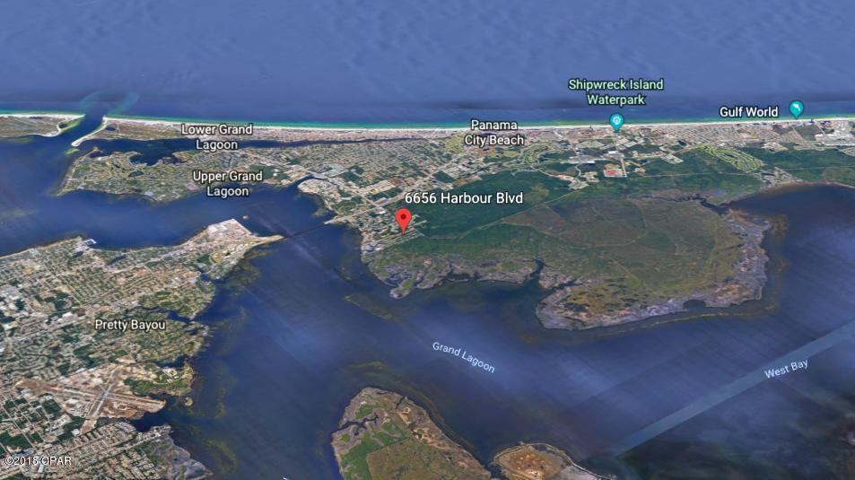 CANAL-FRONT LOT.  Seawall already installed.    Where are you going to find a lot under $80,000 where you can KEEP YOUR BOAT IN YOUR BACK YARD.  Very nice amenities in Harbour Towne, pool, tennis courts, very low HOA dues.