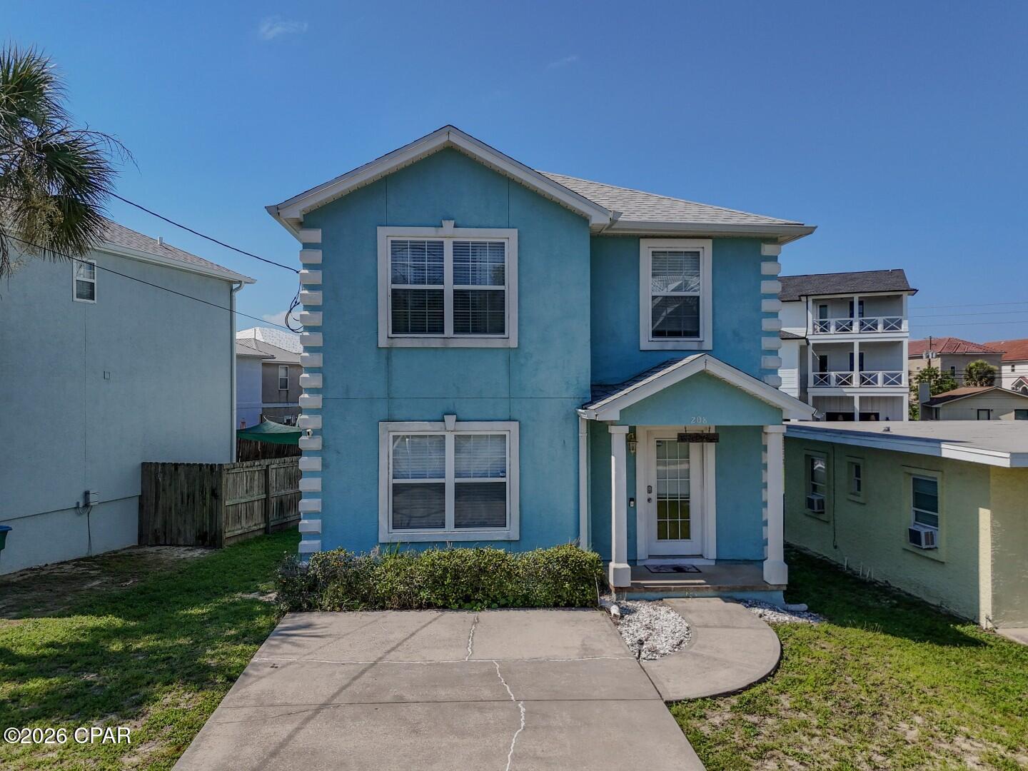 Welcome to 208 Le Grand Drive, a beautifully updated, fully furnished coastal retreat just a 5-minute walk to the beach. PLUS NO HOA and SHORT Term Rental Allowed. This inviting 3-bedroom, 2.5-bath home offers 1,496 square feet of comfortable living space, making it ideal as a primary residence, second home, or income-producing vacation rental. Natural light, tasteful updates, and an open layout create a warm, welcoming atmosphere perfect for relaxing or entertaining. Nestled in a quiet neighborhood, you'll enjoy the best of the Emerald Coast with 30A just 10 minutes west and Pier Park only 10 minutes east for shopping, dining, and entertainment. Best of all, everything conveys with the sale, making this a truly turnkey opportunity. Don't miss your chance to own a move-in-ready beach home!!!!