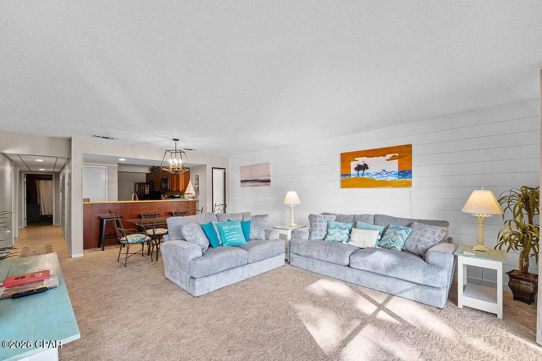 Welcome to your perfect beach getaway at Edgewater Beach Resort! This beautifully maintained 2-bedroom, 2-bath end-unit villa comes fully furnished and is ready to enjoy as a primary residence, vacation home, or investment property.

Located just a short stroll from the sugar-white sands of Panama City Beach, this spacious villa offers an open-concept living and dining area, granite countertops, abundant cabinet space, updated lighting, and tasteful coastal furnishings throughout. The oversized bedrooms each feature private balcony access, while the primary suite includes a large walk-in owner's closet, dual vanities, and an updated tiled tub/shower. Peaceful pond views provide the perfect backdrop for your morning coffee or evening unwind.

Edgewater Beach Resort is one of Panama City Beach's premier full-service gated resorts, offering an unmatched amenity package including private beach access via the pedestrian bridge, the spectacular lagoon-style beachfront pool, additional community pools, golf, tennis, pickleball, shuffleboard, fitness center, on-site dining, walking paths, and beautifully landscaped grounds.

Whether you're looking for a beach retreat or an excellent investment opportunity, this turnkey villa offers exceptional value in one of the area's most desirable resort communities. Schedule your private showing today!