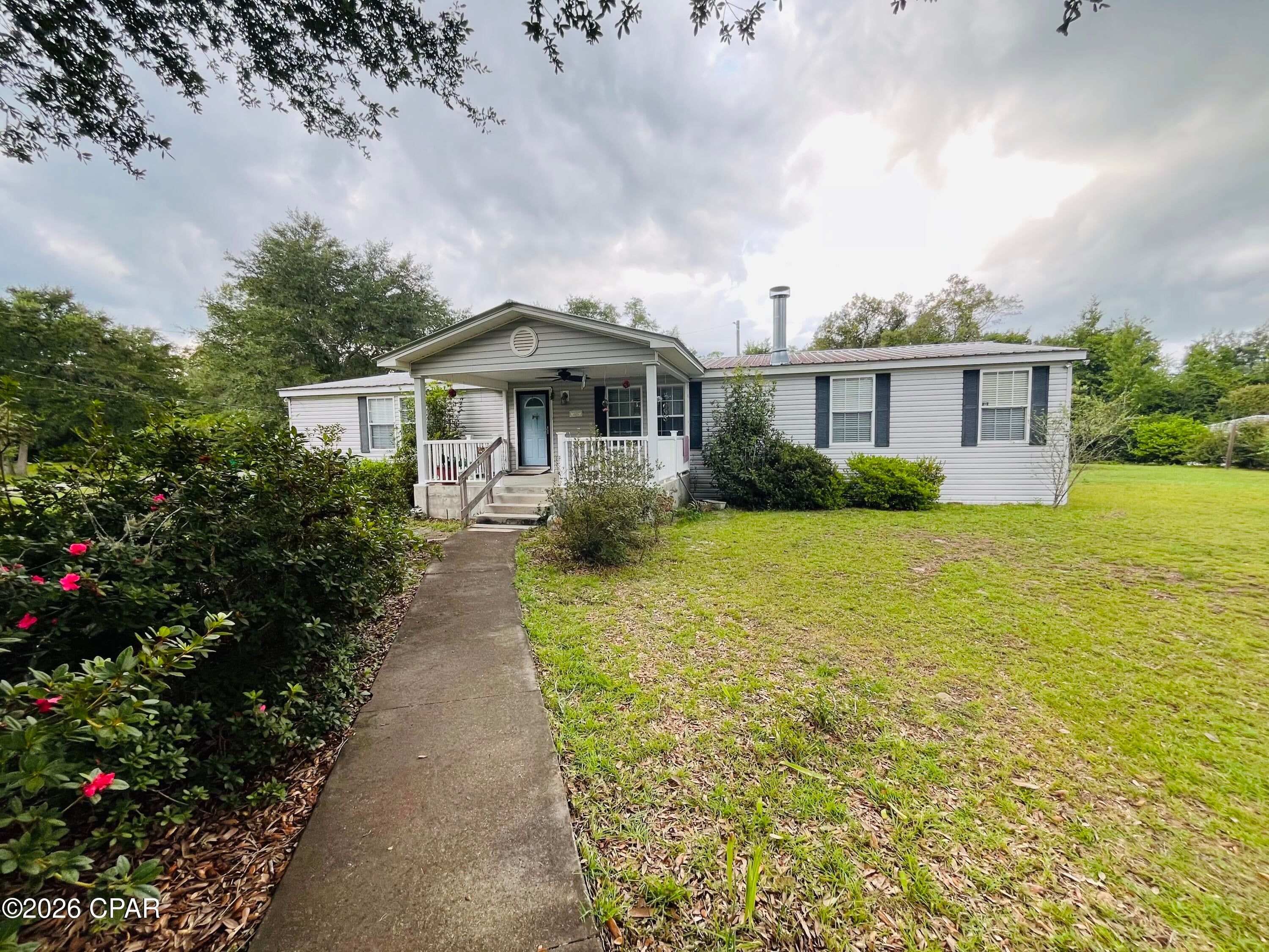 Under Contract, accepting backup offers. Welcome home to this beautifully maintained 2,200+ square-foot residence, perfectly situated on a spacious lot just shy of one acre in a peaceful, established neighborhood. Offering the ideal blend of comfort, style, and functionality, this home features numerous upgrades designed for everyday living.

Inside, you'll find a modern, updated kitchen that's perfect for preparing meals and gathering with family and friends. The spacious floor plan includes generously sized bedrooms, providing plenty of room for everyone to relax. The primary suite offers a large walk-in closet and a beautifully tiled walk-in shower, creating a comfortable private retreat.

Additional highlights include a durable metal roof for long-lasting peace of mind and a large covered back porch that's ideal for morning coffee, outdoor dining, or simply enjoying the quiet surroundings. With ample outdoor space, thoughtful updates, and room to grow, this property offers the perfect place to call home.

Enjoy the slower pace of small-town living while remaining conveniently located to Tallahassee, Dothan, and Panama City, giving you easy access to shopping, dining, employment opportunities, and the beautiful Gulf Coast beaches while still enjoying the peace and privacy of country living.