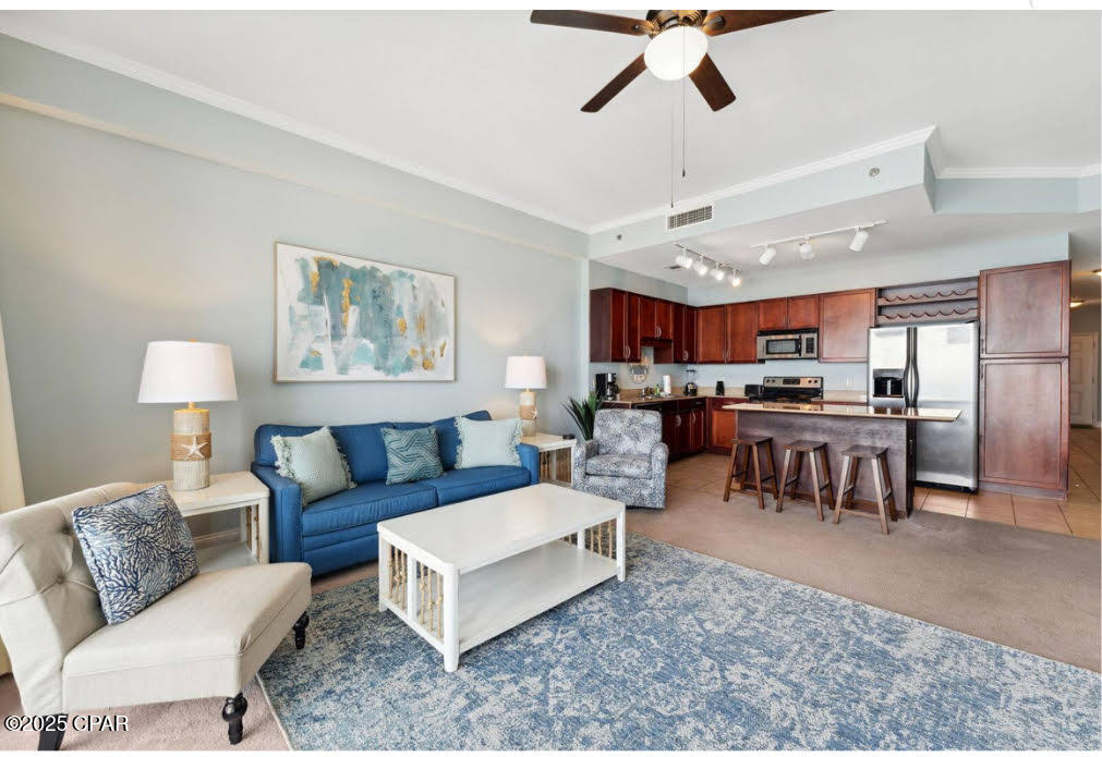***New Penthouse Listing*** If you want one of the best Gulf Views from the highest levels of Laketown Wharf Resort then this unit #2119 is a must see. Sunsets are breathtaking and the condo is being sold furnished and also includes all like new stainless kitchen appliances. This unit is professionally managed and professionally cleaned after every rental. It is in pristine condition and features the following attributes: 1 Master Bedroom, 1 Bunk Room, each with its own private bathroom (2), Like new LVP flooring in the grand-room, tile in the kitchen, baths and hallways and carpet in the master bedroom. This condo/home has a coastal elegant decor and when you step out onto the covered balcony you see the Gulf of America for miles and miles! From your front door your view is of the Laketown Wharf Resort Lake and boardwalk. Home to many eateries, giftshops, bars and the new 810 Bowling and Billiards destination. One great feature is that the COA dues are better than most local condo complexes, the square footage is more (1047 sq. ft.) and fee's include: INSURANCE,WATER,SEWER,TRASH,PEST CONTROL,CABLE,INTERNET, 5 POOLS, PRIVATE GATED BEACH ACCESS, SECURITY, POSTAL SERVICE and access to the 2 STORY GYM, PICKLEBALL, BOARDWALKS and the NIGHTLY LAS VEGAS LIGHT SHOW/MUSIC.

When you compare the value and the income potential from possible short term rental income, you get more for your money for sure. Come and see this unit soon. Check out all the pictures and video provided.

Polywood type furniture on the balcony and other balcony furniture convey as well.

Take notice of the higher ceilings afforded in all Penthouse units! This makes the space feel even bigger and more open and very comfortable. PLUS notice the additional Transom Windows overlooking the beach too!