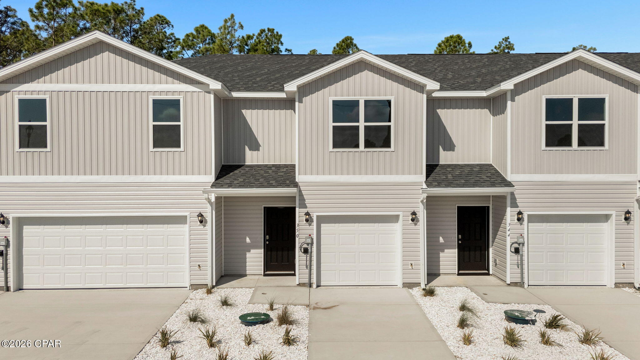 Welcome to the Sabal plan, a new home at Chateau Nemours located on the edge of Port Saint Joe, Florida. This Sabal Townhome floor plan is an interior unit. These thoughtfully designed townhomes offer 3 bedrooms and 2.5 bathrooms with a 1-car garage. On the outside of these units, you will see quality vinyl siding exteriors, steel garage doors equipped with openers, weatherproof outlets, hose bibs, and Kwikset deadbolts on all exterior doors. As you enter inside, you will feel right at home with beautiful EVP flooring at your feet, leading you to the open living room and kitchen or the spacious upstairs. In the kitchen and bathroom, you will find gorgeous granite countertops, white cabinets with brushed nickel hardware, and stainless-steel appliances in the kitchen. Stay cool during the summers with energy-efficient cooling and heating systems, Low-E insulated windows with screens, and water-saving elongated toilets. For added security, every home comes equipped with Smart Home Technology, including a Safe Haven Surveillance system, Skybell doorbell, Honeywell thermostat, and DEAKO Smart Switches. Rest assured with a one-year builder's warranty from D.R. Horton and a ten-year structural warranty through RWC. Located just 3 miles from Port Saint Joe, you will find all that this popular town has to offer in including shopping and local restaurants close by. Chateau Nemours is located just 11 miles to the exotic Cape San Blas peninsula where you'll find peace and quiet to enjoy a sunny day at the beach or get some fishing in at Indian Pass. The main feature of Chateau Nemours is the historic building that was relocated from another part of town and is now being remodeled into a luxurious restaurant. These townhomes are right around the corner from it as well as the community pool. This community will be one of the most talked about communities in the area. To learn more about Chateau Nemours, get connected with us today and see what this community is all about.