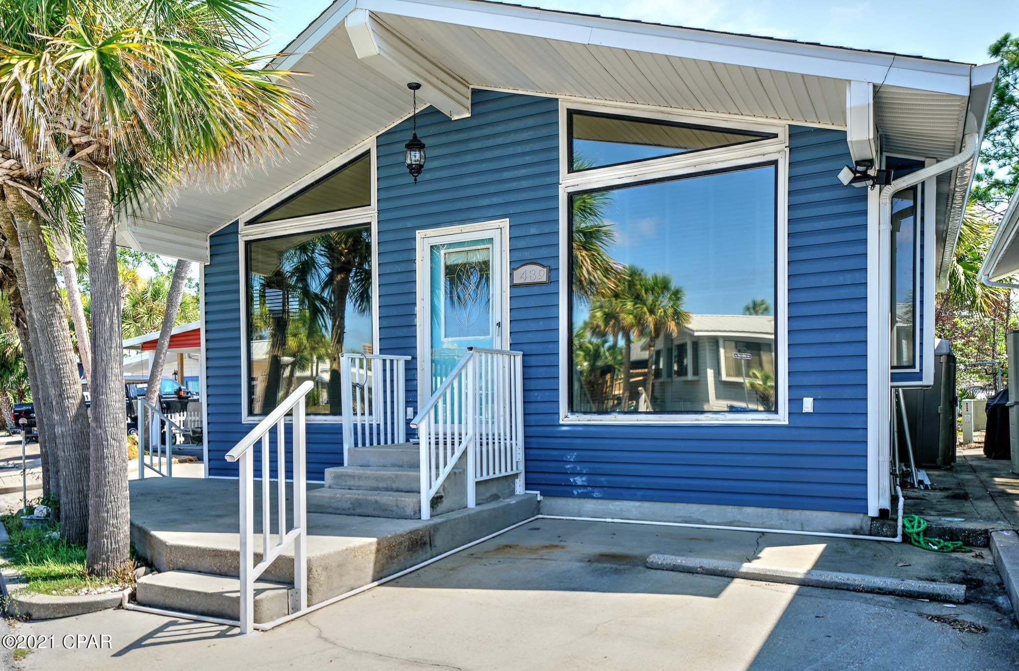 Great opportunity to own in Venture Out! Located on the highly sought after State Park side. This means you will have fantastic views of St. Andrews State park right in your own backyard! This home has a fantastic open floor plan room and would be an outstanding investment opportunity or second home.  Venture Out is a golf cart community that has exploded with popularity recently... With 300' on the beautiful pristine beaches of the Gulf of Mexico and 1,000' on the Grand Lagoon. Venture Out has something for everyone. With 2 pools, fishing pier, boat dock and much, much more!