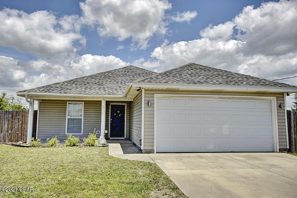 Great starter three bedroom two bathroom home with a two car garage.   This home has a large fenced in back yard with a covered patio.     Inside the home is a large living space with great natural light. The living room is open to the kitchen for easy conversation.   The home is in a quiet neighborhood but just a short drive from anything you may need.