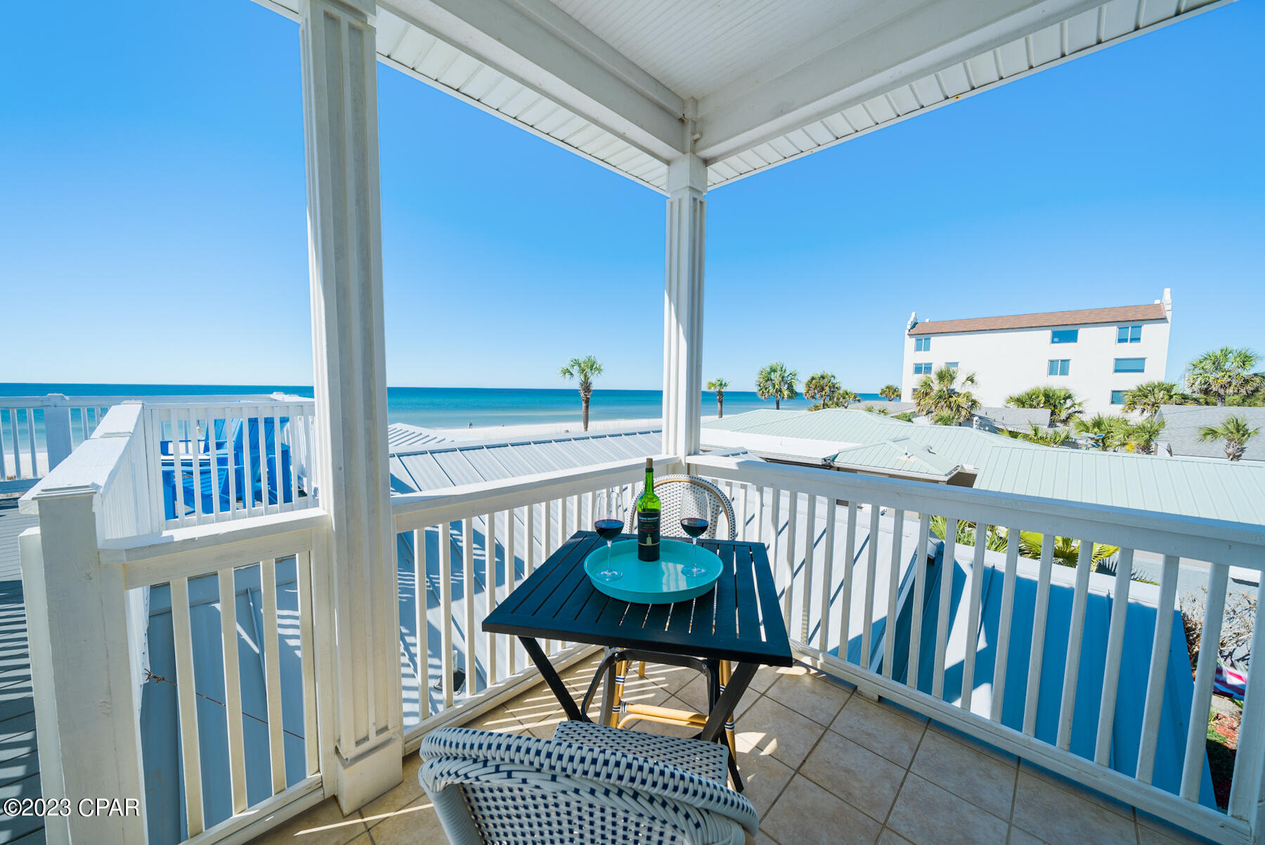 This large gulf-front lot with two beach homes makes this a gem for rental income. Sharing a stunning gulf-front overlook, this impressive beachfront property has a total of six bedrooms and five baths. The two beach houses are connected by a walkover that delivers sensational views of the emerald gulf and beautiful white sandy beach. There's ample parking, a hot tub and more than 1,000 square feet of outdoor living space on a series of decks and terraces. It's an idyllic location for enjoying uninterrupted sunsets and beach-watching. The two-story beach house has two beds, two baths and a bunk room. The spacious kitchen in the main house is fully equipped for families and friends to prepare tasty food and drinks or order up a takeaway. Gather for meals in the dining room or outdoors on the gulf-front deck. Wood flooring and a huge fireplace sit beneath the deep tray ceiling in the sitting room. Stunning views take in panoramic sunsets over the gulf through a series of windows. There's also a covered terrace for chilling out with icy drinks. Closer to the beach, the three-bedroom gulf-front cottage has a modern open floor plan and incredible gulf views. There's a huge sun deck, a shady covered patio and a hot tub on the gulf side of the cottage for relaxing and daydreaming in the bubbling water. The living room boasts a series of windows welcoming daylight into the living space and framing unbelievable views of the dunes, beach and beyond. There's a separate dining room and a modern kitchen, although you'll probably want to spend most of the time on the terrace and beach. This one-of-a-kind beach house is accessible via a private driveway from Front Beach Road. There's ample parking for eight cars and coffee shops and restaurants are right across the street.