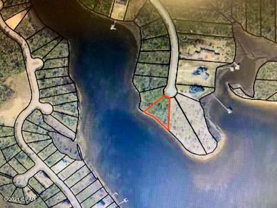 FABULOUS BUILDING LOT WITH UNFETTERED ACCESS TO THE GULF. Entire lot is in Flood Zone X!!! Enjoy incredible sunsets, fishing, crabbing, bird watching, kayaking, paddleboarding, canoeing, boating from your backyard which has 227 feet of waterfront! Deep sea fishing is less than 30 minutes away, by boat, as is Shell Island and St Andrews State Park. Amenities include a community pool, boat launch and dock and camper and RV storage. This is a gated community, close to Tyndall AFB and Eastern Ship Building.