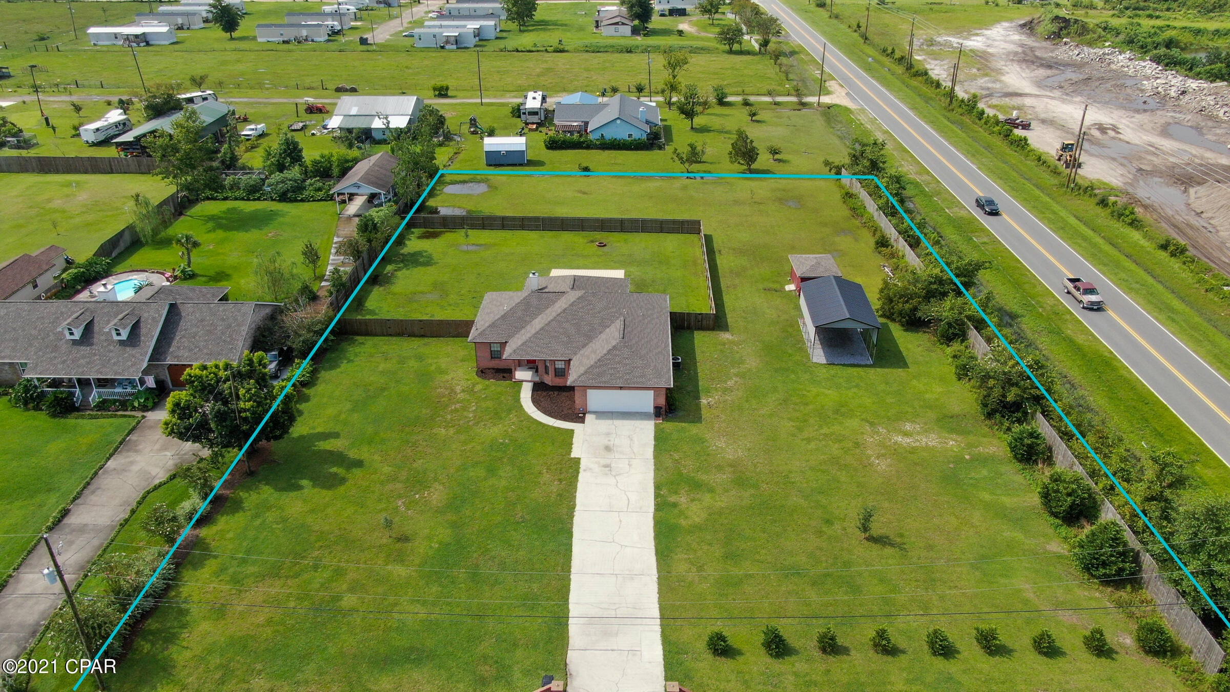 'CURRENTLY UNDER CONTRACT, SELLER ACCEPTING BACKUP OFFERS'  Don't miss your chance to check out this 4bd/2bth all brick home located on a huge corner lot, just over 1.3 acres! Plenty of room for all your outdoor needs, this property is located on the corner of Star Ave and Stewart Drive features new roof (2019), new carport (2020) with fenced in backyard for some additional privacy. Interior showcases split bedroom floorplan with vaulted ceiling in the the living room, complete with wood burning fireplace. Guests and family are offered additional privacy with the pocket door to the hall bedrooms. The updated kitchen is a chef's delight with amble cabinetry, plenty of cook/prep space, updated stainless steel appliances and decorative backsplash. Just off the kitchen is the front bedroom that would make for a great office. Down the hall you will find the master bedroom, featuring on suite master bathroom with tiled showered. Just off the living room is the Florida Room, offering another oportunity for a play area or additional family room. Covered back patio offers plenty of shade for outdoor bbqs. House also features water softner system currently rented through Culligan Services for $112 a month. Two water heaters, 50 gallon (2016) and 30 gallon, so no concerns of running out of hot water. HVAC installed in 2016. Washer/Dryer to convey. No HOA and a short drive to Tyndall AFB or into town from Hwy 231. Don't miss your chance to preview this great piece of property today! All sizes/measurements are approximate; please verify if​​‌​​​​‌​‌​​​​‌​​‌​​​​‌‌ important!